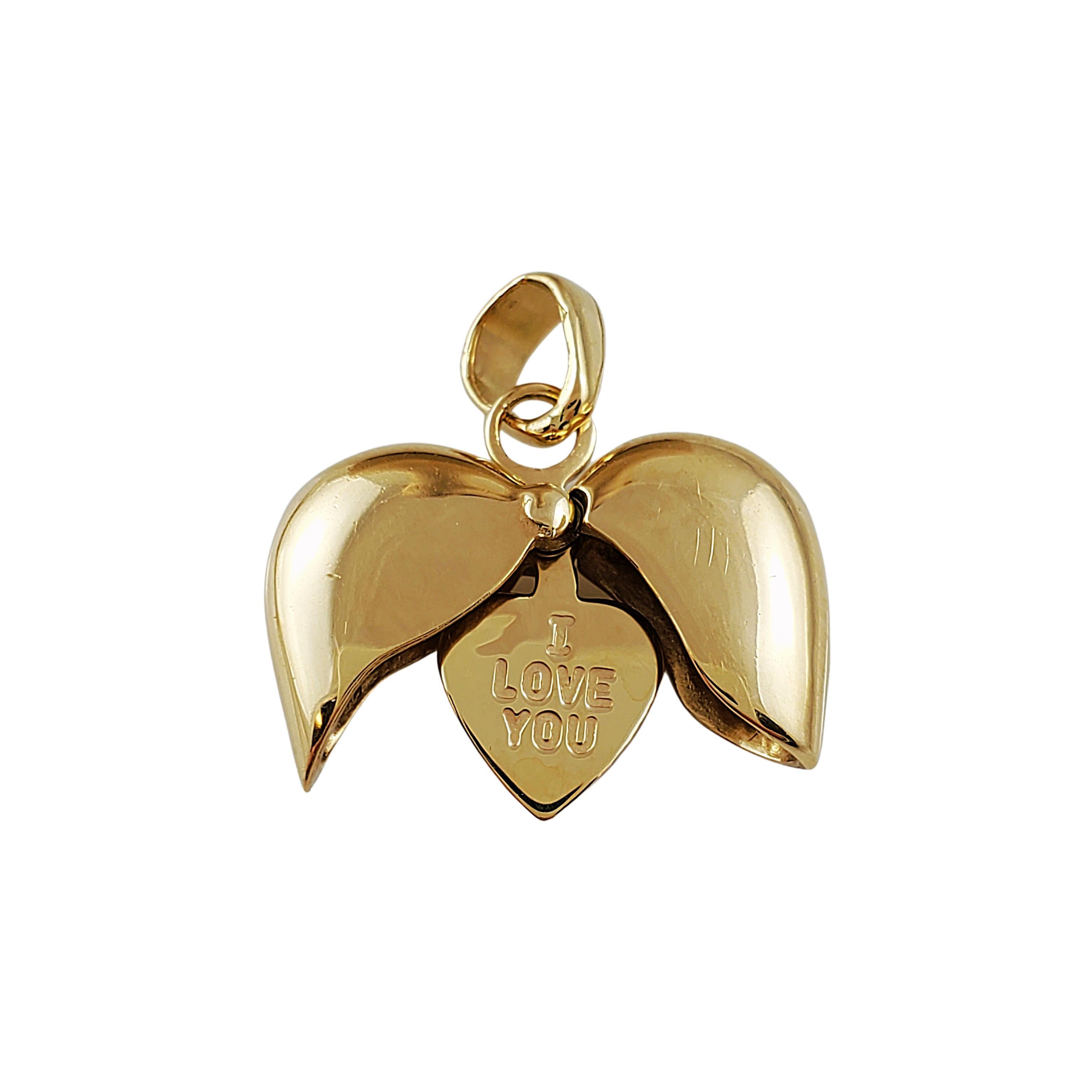 Vintage 14K Yellow Gold I Love You Heart Charm

Beautiful heart charm mechanically opens and closes to see the inscription on the inside that says 