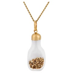 Colgante vintage de oro amarillo de 14k con forma de botella