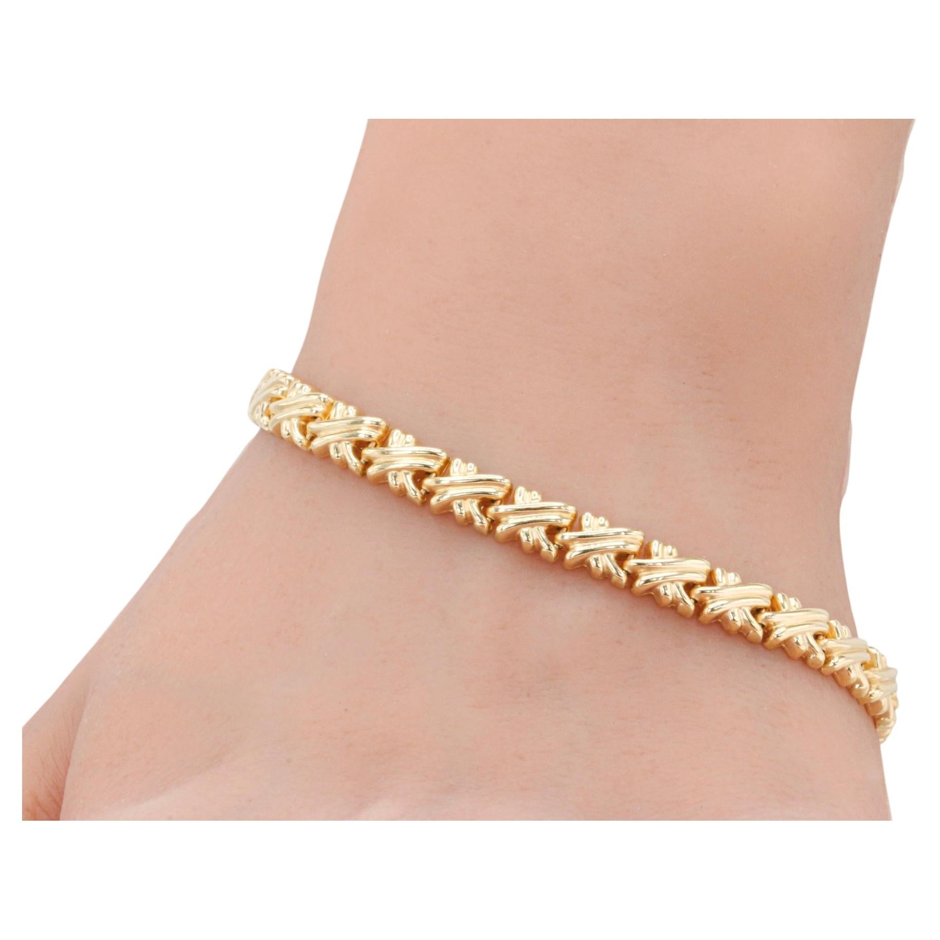 Bracciale a X italiano d'epoca in oro giallo 14 carati