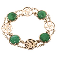 Gliederarmband aus 14 Karat Gelbgold mit Jade