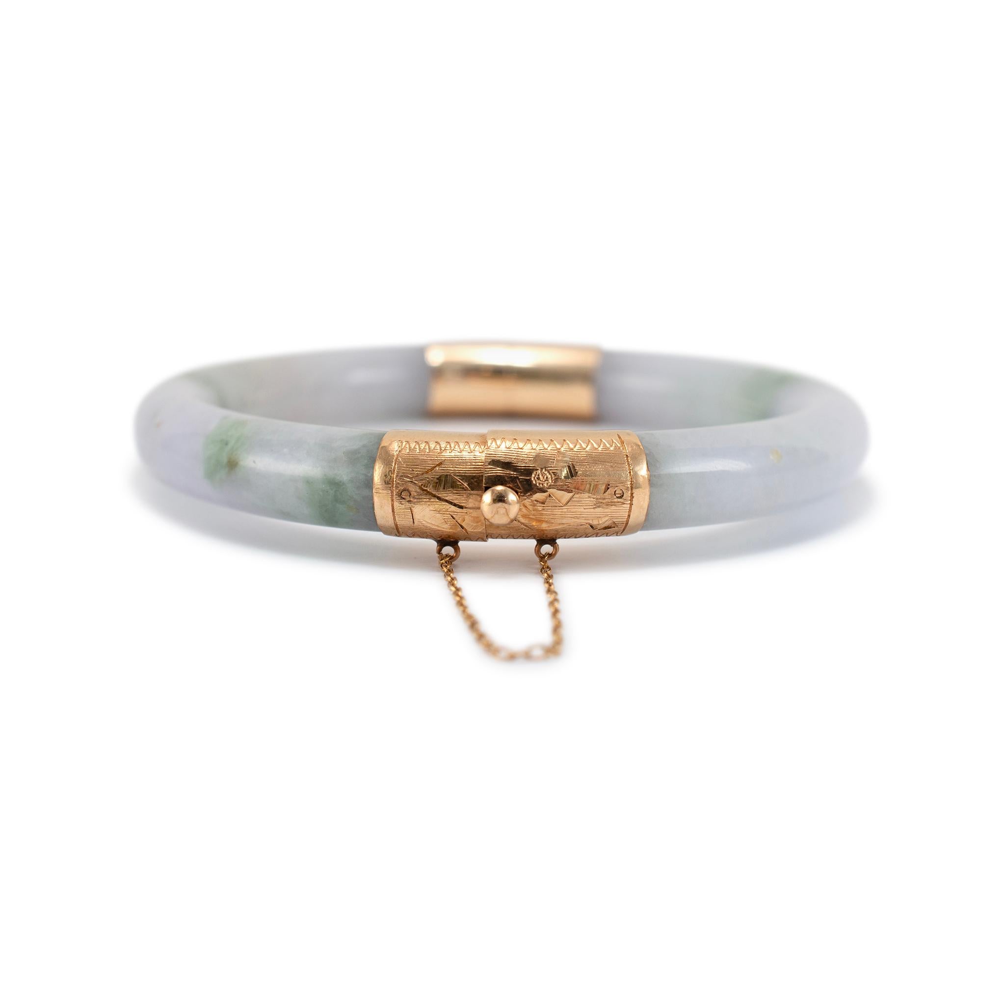 Gender: Ladies

Metal Type: 14K Yellow Gold

Length: 7.00 inches

Width: 9.35 mm

Weight: 44.74 grams

One ladies 14K yellow gold jadeite vintage bangle hinged bracelet. The metal was tested and determined to be 14K yellow gold. Engraved with 