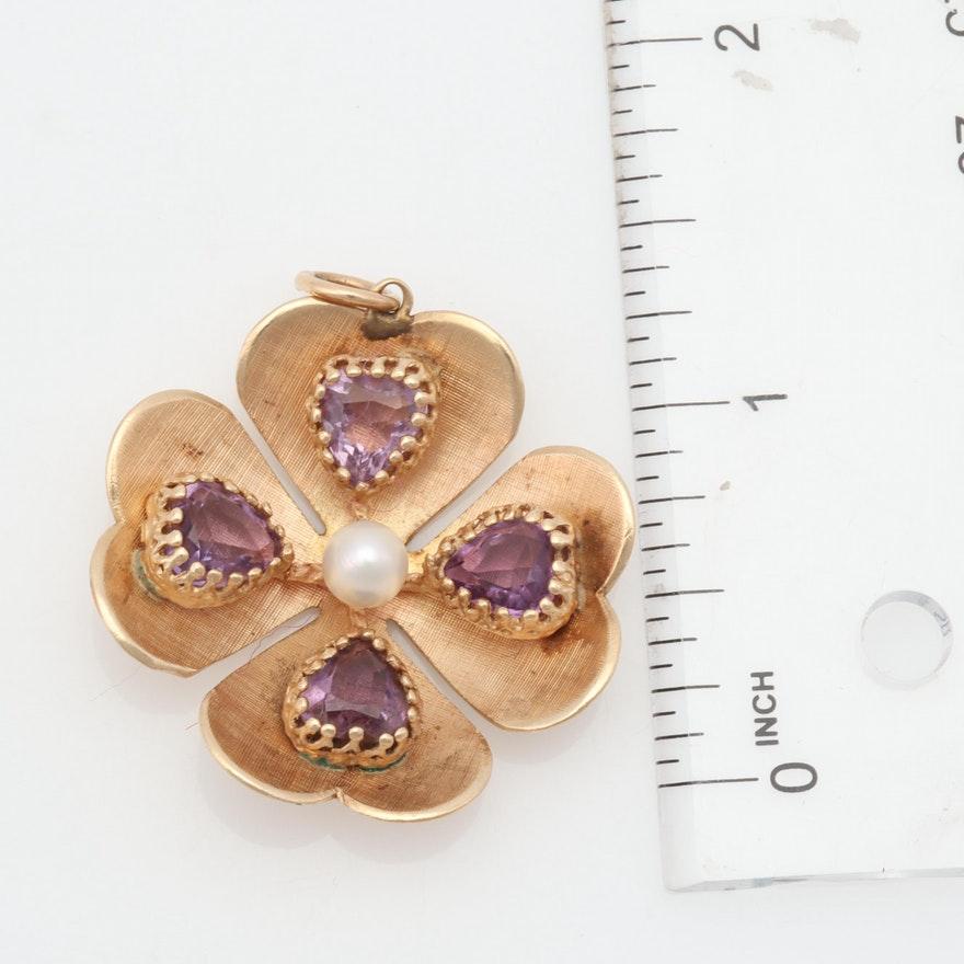Item Details
Style:	Vintage
Materials:	14K Yellow Gold
Hallmarks:	SW 14K
Total Weight:	8.05 dwts
Center Stone Type:	Pearl
Center Stone Shape:	Half Drilled Bead
Center Stone Dimensions:	5.50 mm
Side Stone Type:	Amethyst
Side Stone Shape:	Heart