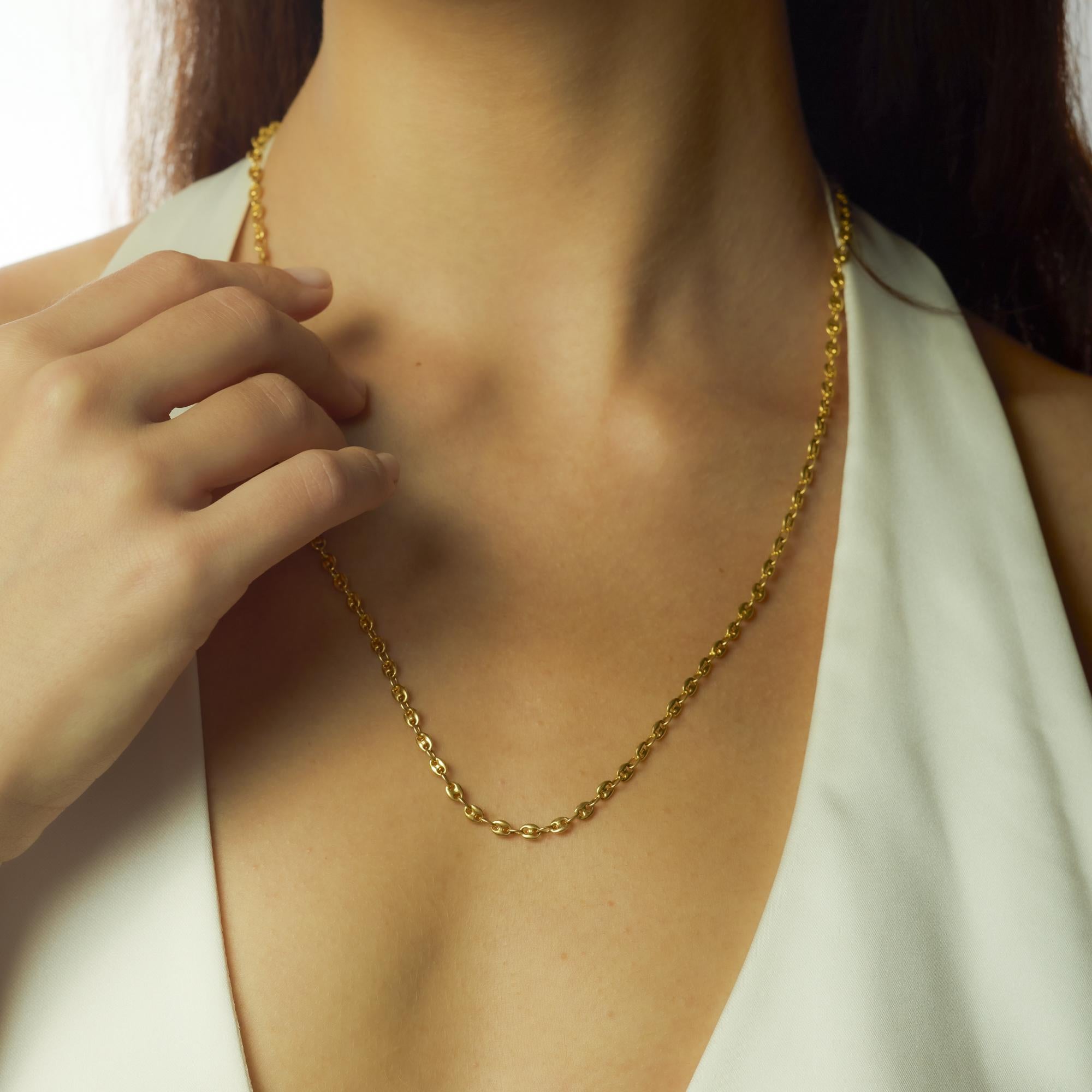 Questa collana vintage degli anni '70 è realizzata in caldo oro giallo 14k e offre un design versatile e senza tempo. Con una lunghezza di 23,25 pollici e un peso sostanziale di 12,91 grammi, si drappeggia con eleganza e si abbina senza sforzo sia