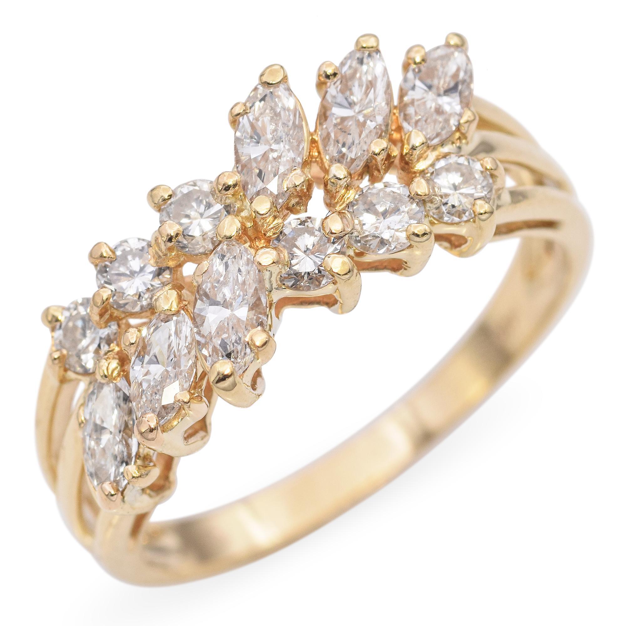 This exquisite ring is crafted in gold, featuring a stunning array of marquise and round-cut diamonds. The diamonds are set in a captivating cluster design, creating a sparkling display. The band consists of three gold strands, adding a unique touch