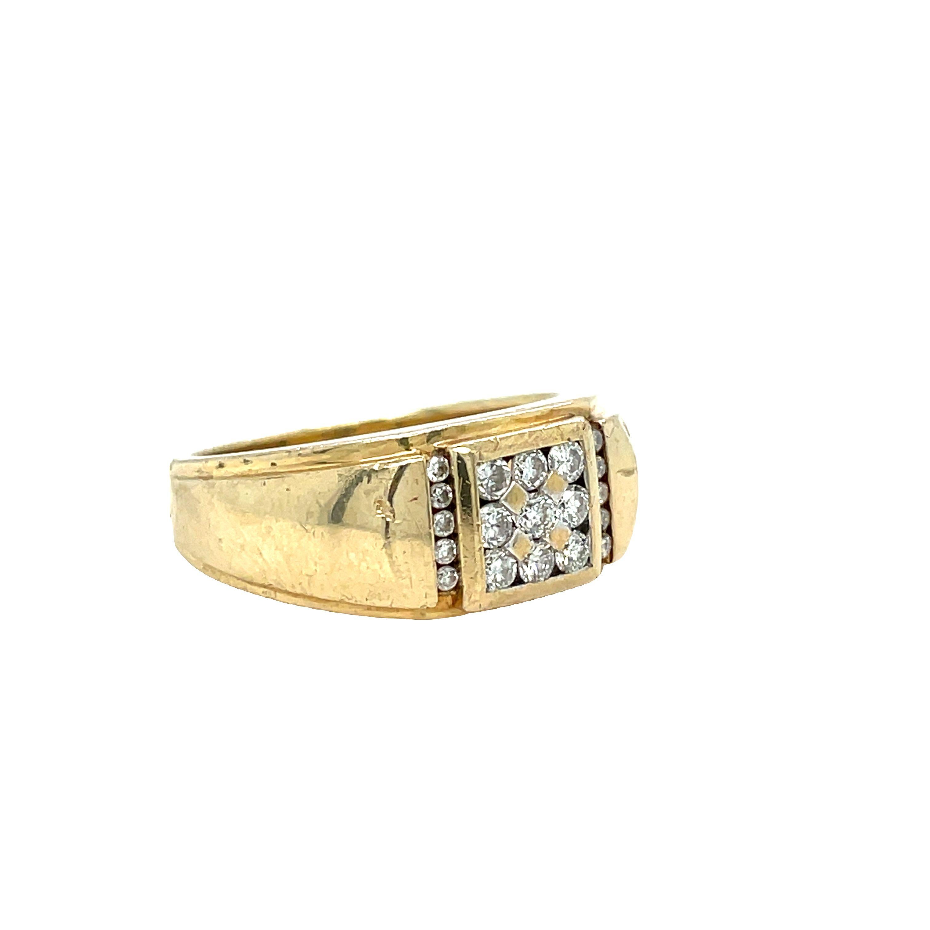 This Vintage 14K Yellow Gold Men's Ring is crafted with elegance, it showcases nineteen round brilliant cut diamonds weighing approximately 0.55 carat total weight. The center of the ring has shared prongs nine dazzling round brilliant cut diamonds,