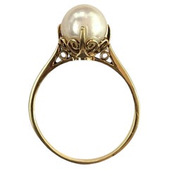 Anillo vintage de oro amarillo de 14 quilates con perlas de Mikimoto
