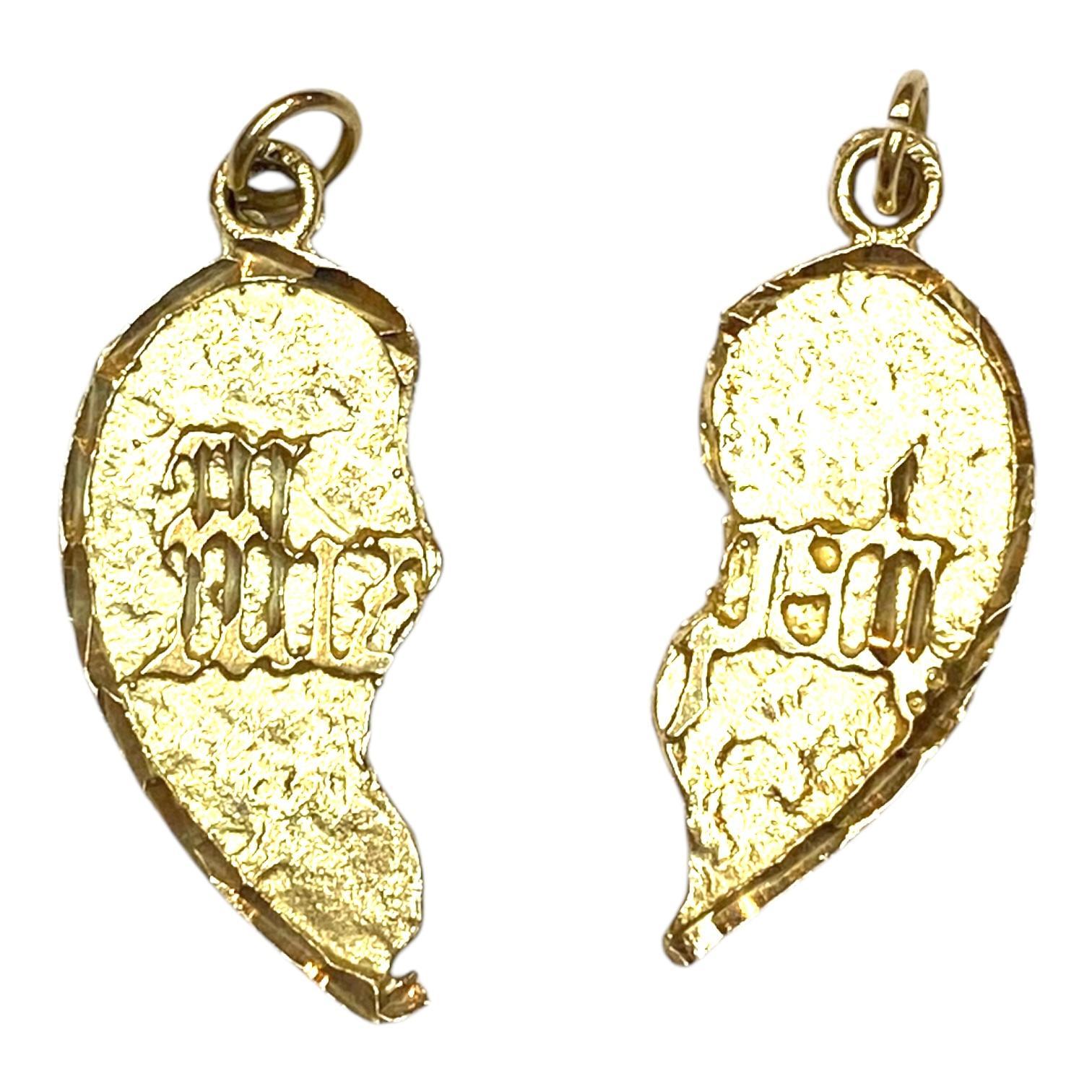Crafted in 14k yellow gold, this Mizpah pendant features a split heart design with intricate engraving. The word Mizpah comes from the Old Testament in the Bible. It is an old Hebrew word that means “Lord watch over me”. Mizpah pendants are usually