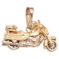 Charm d'epoca in oro giallo 14K con motocicletta e ruote rotanti