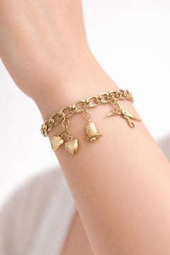 Vintage 14K Yellow Gold Multi Charm Bracelet
