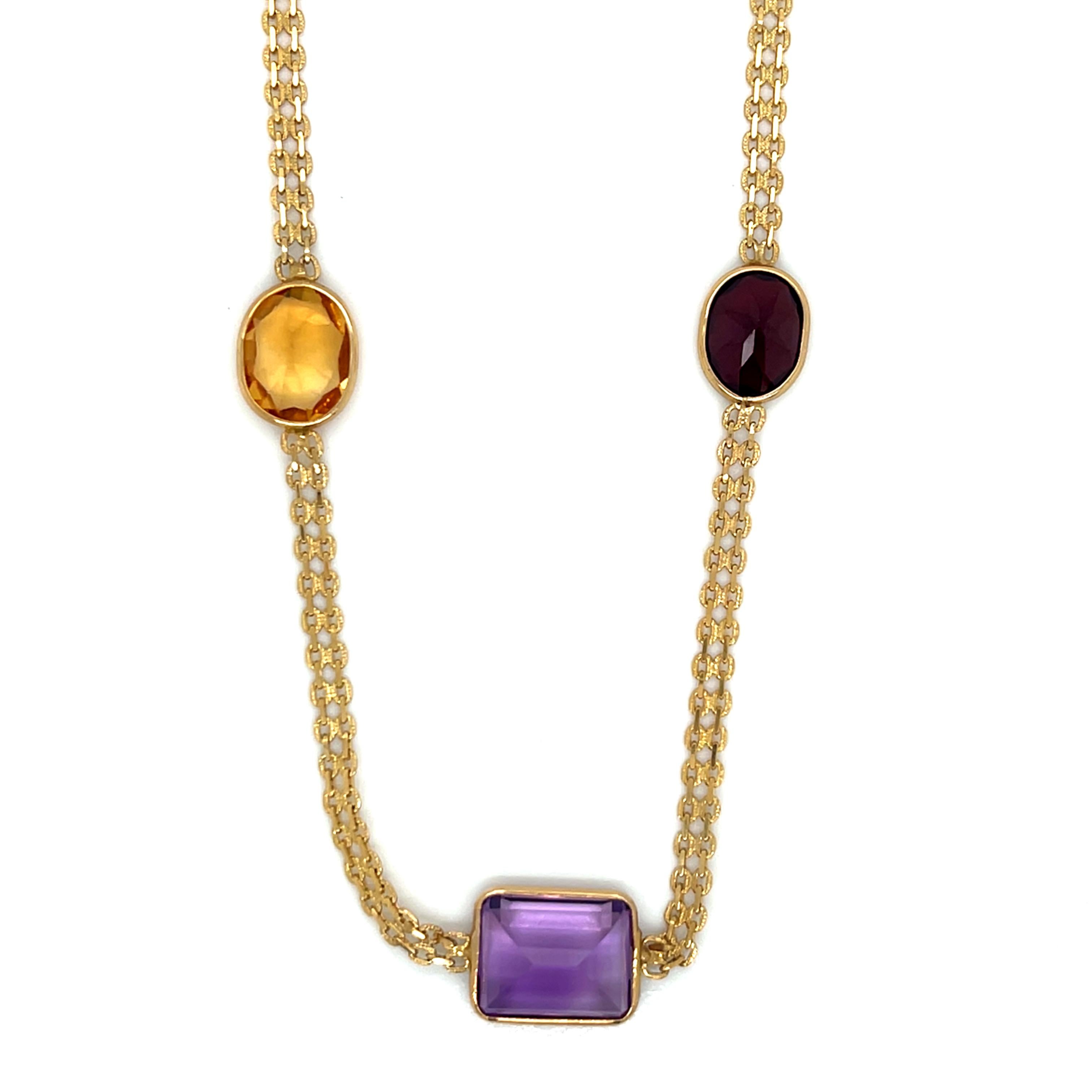 Vintage 14k Yellow Gold Multi-Gemstone Station Necklace

Ce collier vintage captivant met en valeur un magnifique éventail de pierres précieuses naturelles dans un design sophistiqué de style station. Réalisée en or jaune 14k, cette pièce présente
