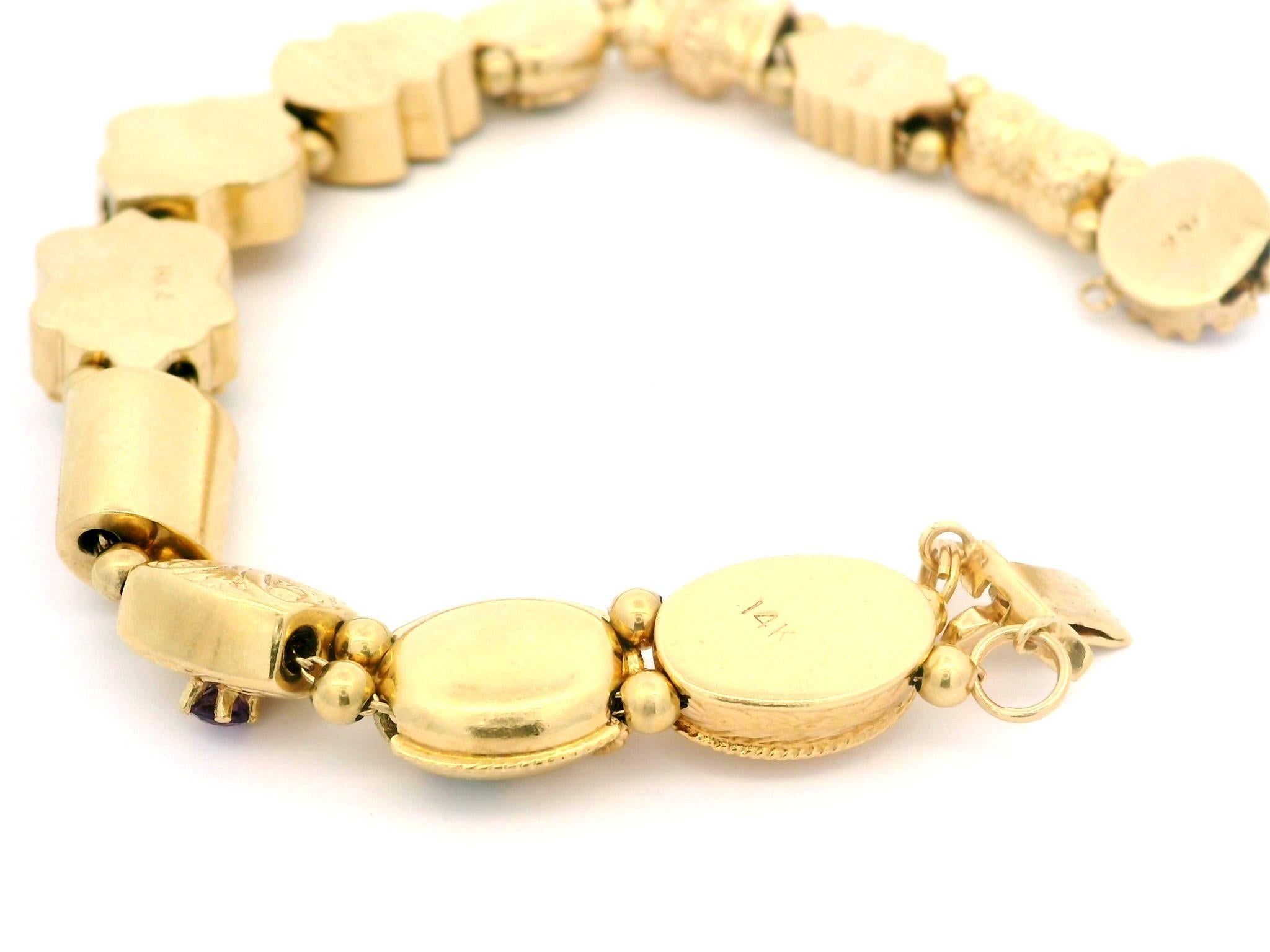 --Stone(s):--
Numerous Natural Genuine Gemstones - Multiple different stones including Opal, Turquoises, Corals & Other Colored Stones - Round Shapes - Bezel & Prong Set 

Material: Solid 14k Yellow Gold
Weight: 34.24 Grams
Type: Dual Cable Link