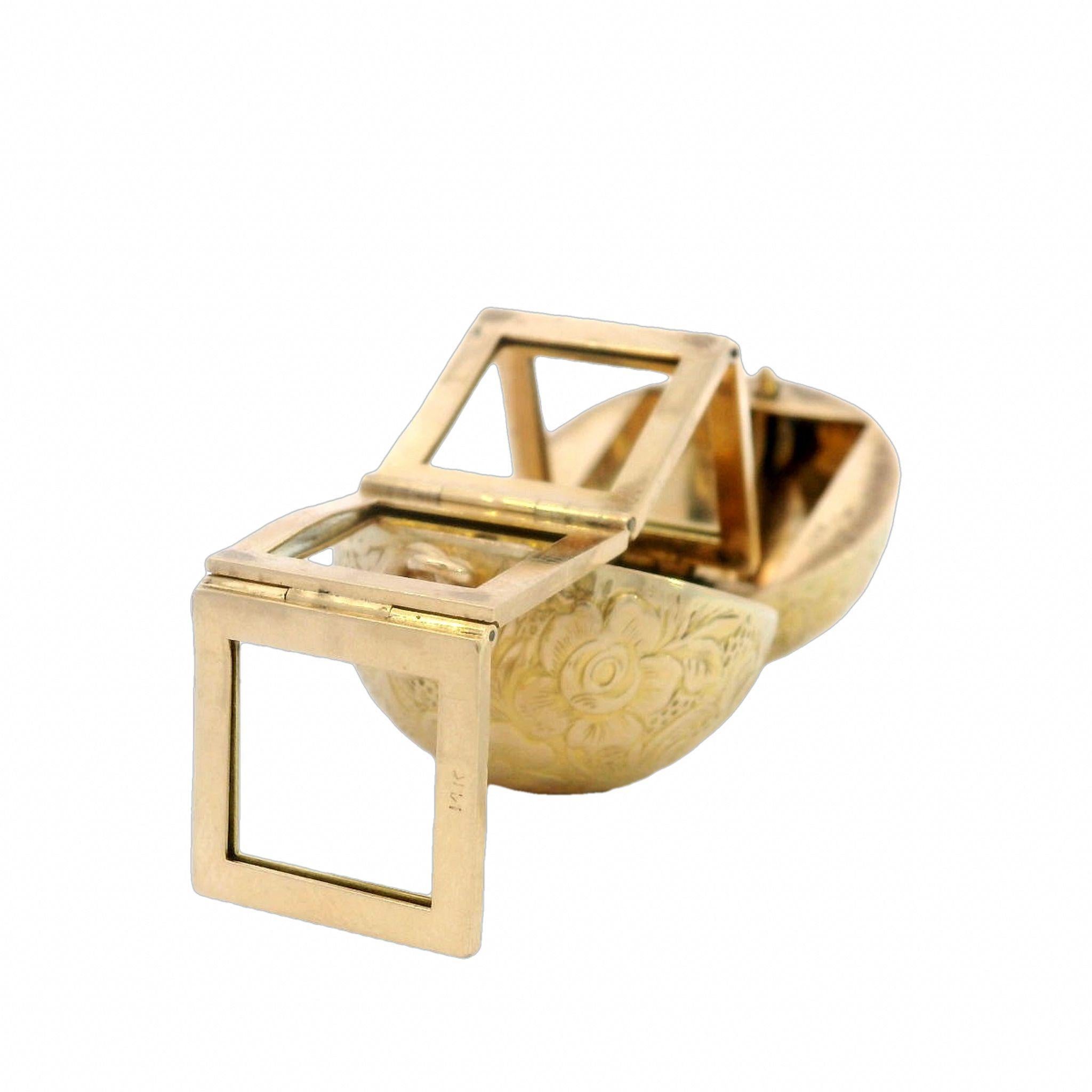 Sphere Locket Pendant

This Antique Sphere Locket Pendant is a timeless treasure, made in rich 14k yellow gold and weighing 20.4 grams. With intricate floral engravings all over its rounded surface, this locket captures the essence of refined