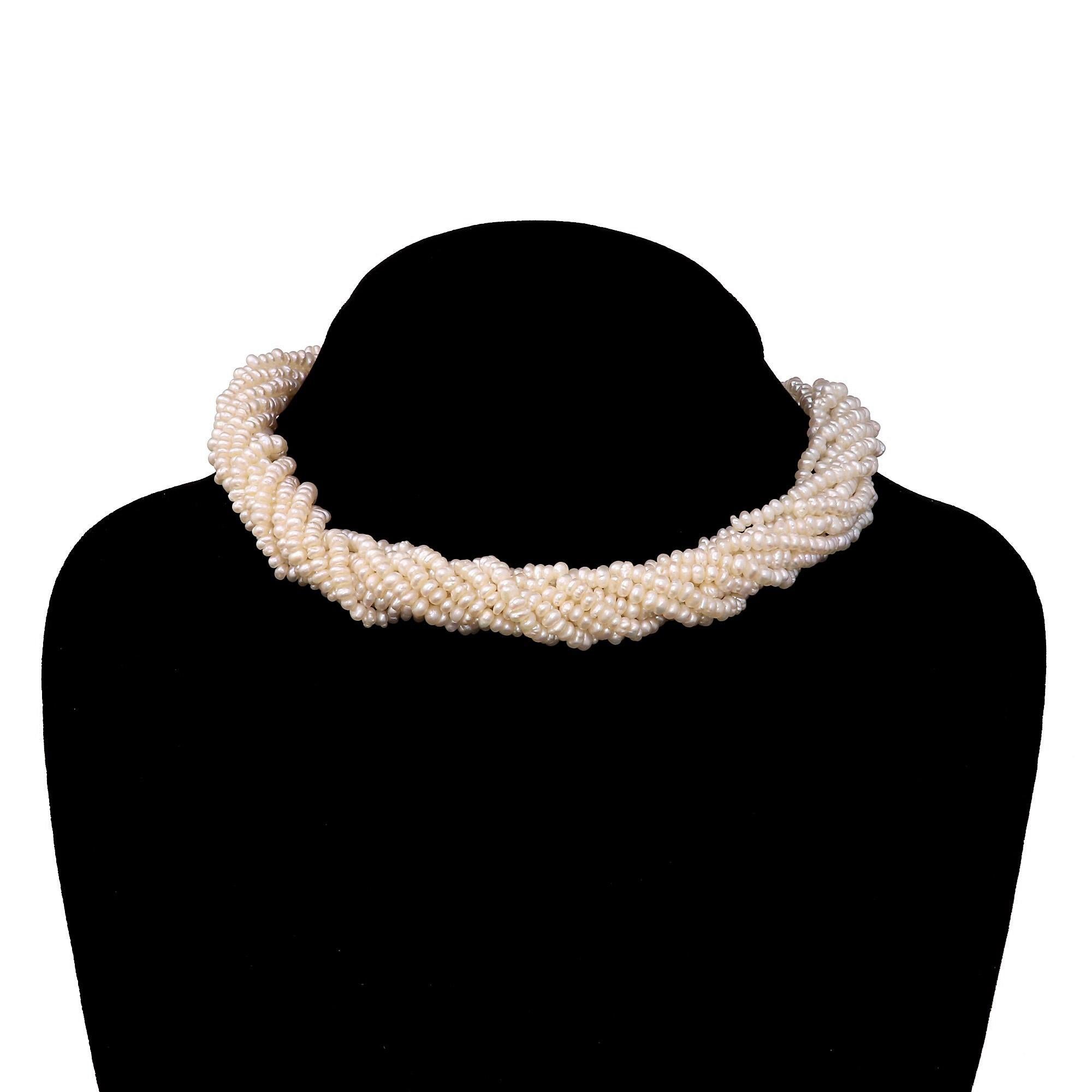 Beautiful vintage 9 strand freshwater pearl necklace with a heavy 14K yellow gold clasp decorated with diamonds.
Be in style this 2020. All the major fashion houses and magazines including Vogue and Harper's Bazaar are saying pearls are
