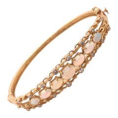 Bracelet jonc vintage en or jaune 14 carats avec opales et diamants