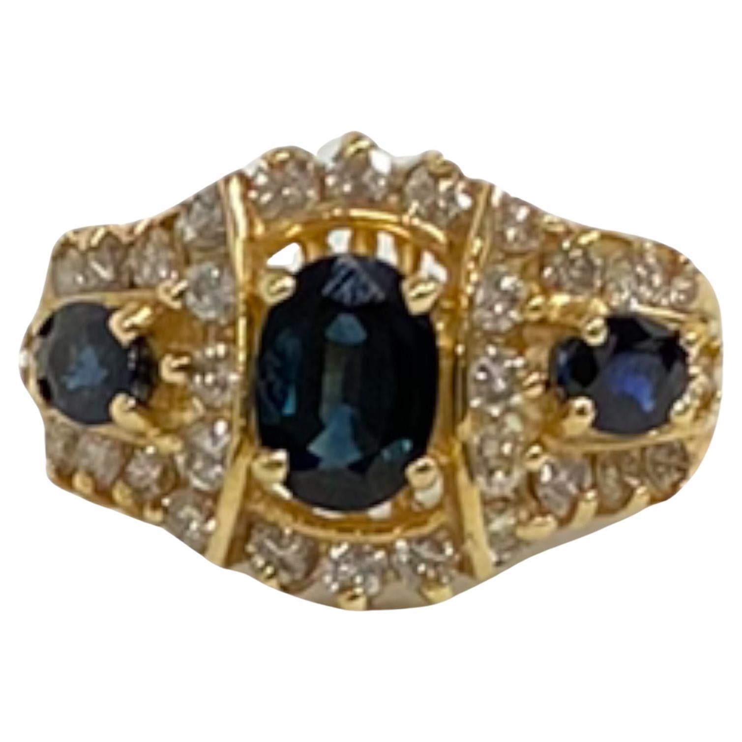 Vintage 14K Yellow Gold Oval-Cut Sapphire and Round White Diamond Ring For Sale