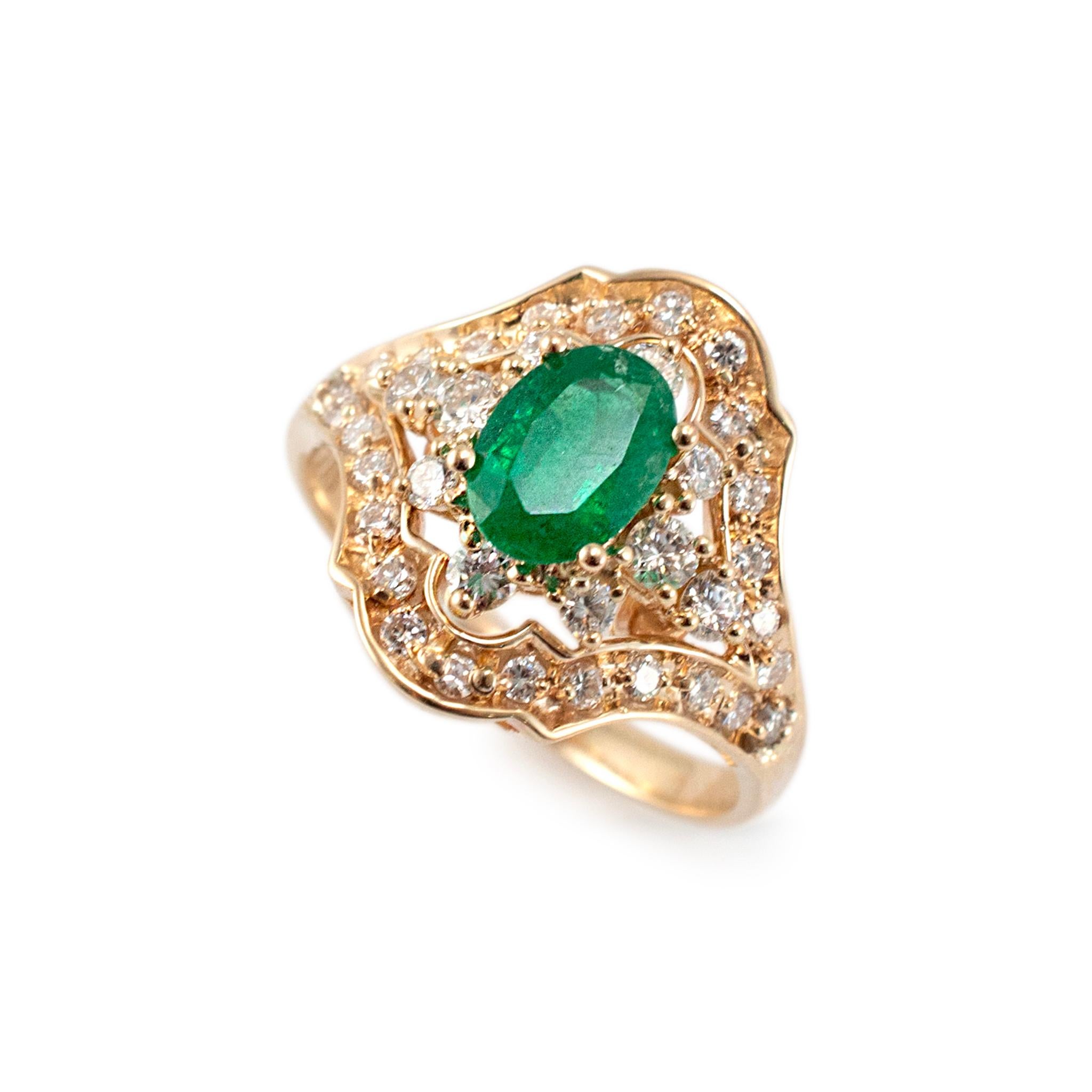 Gender: Ladies

Metal Type: 14K Yellow Gold

Ring Size: 10

Weight: 6.34 grams

One ladies 14K yellow gold, diamond, and emerald vintage halo, accented, cocktail ring with a half-round shank. The metal was tested and determined to be 14K yellow
