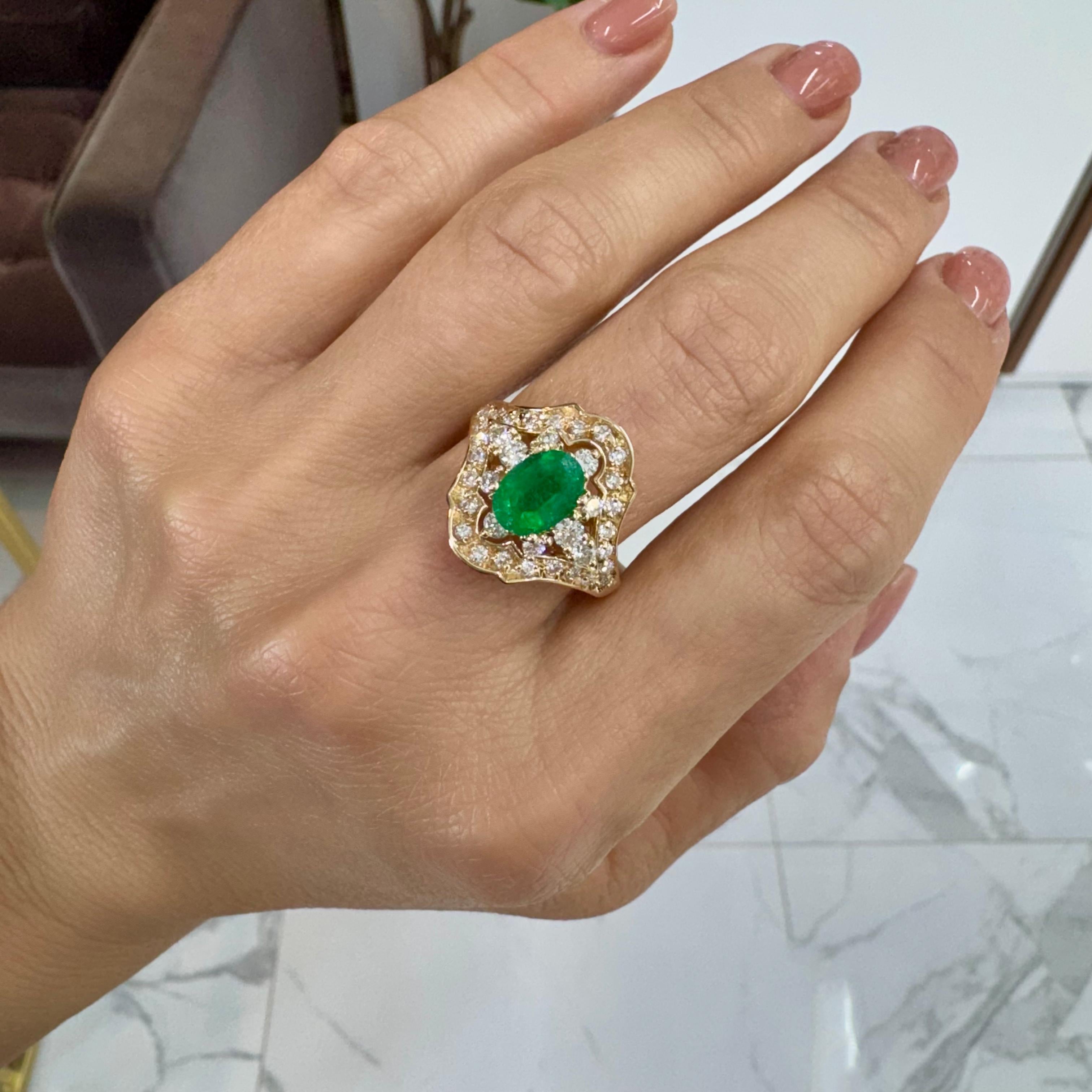 Vintage 14K Yellow Gold Oval Emerald Halo Accented Diamond Shield Cocktail Ring For Sale 3