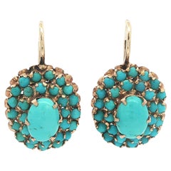 Orecchini pendenti a grappolo in oro giallo 14k con turchesi ovali e rotondi