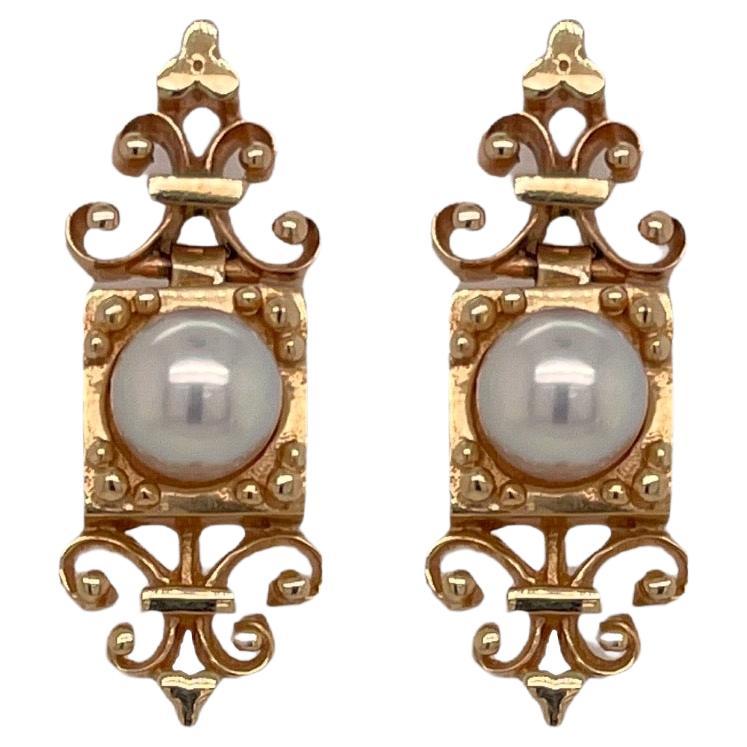 Boucles d'oreilles pendantes vintage en or jaune 14 carats et perles en vente