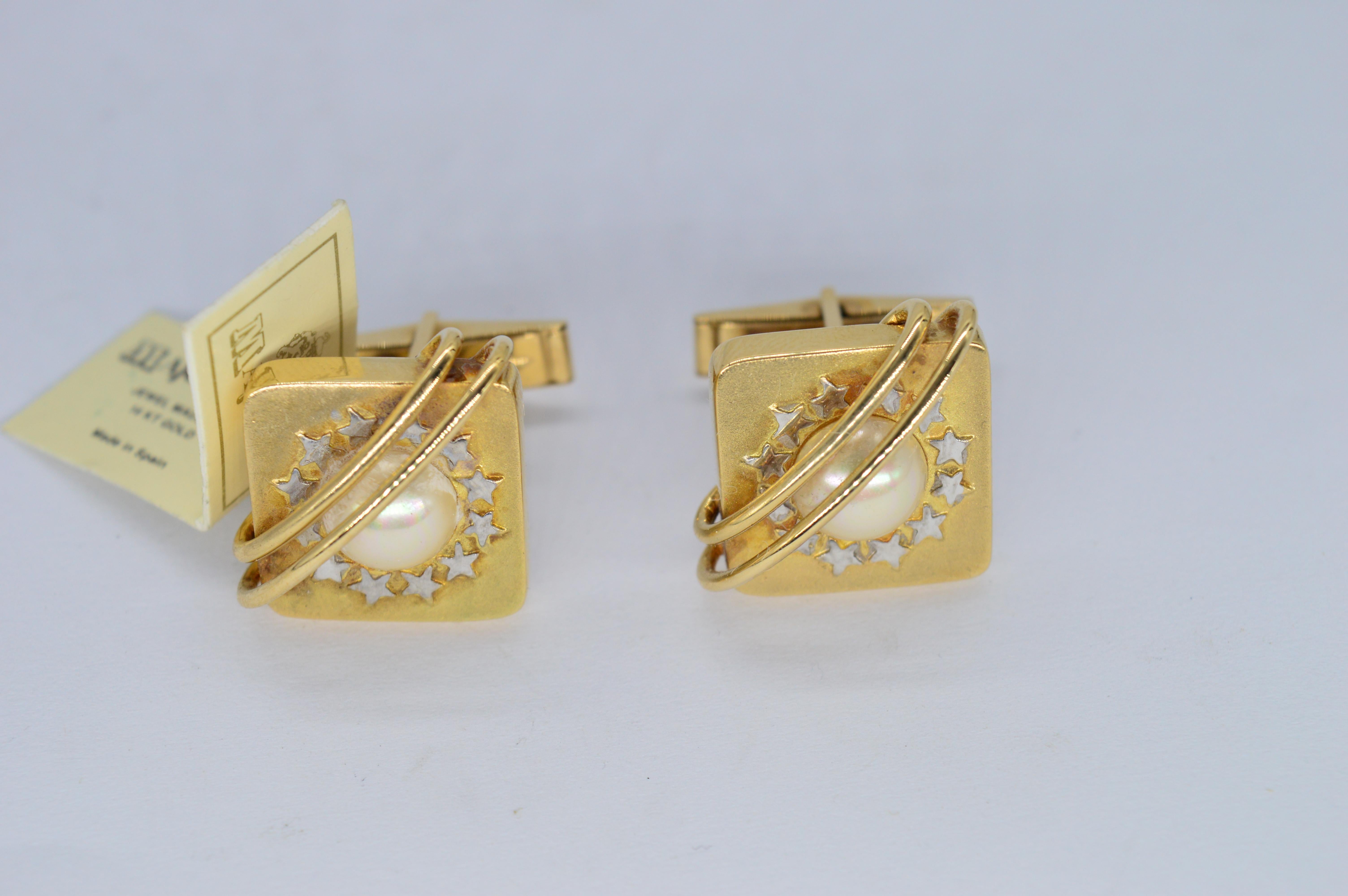A set of boxed 14ct gold commemorative cufflinks, made to celebrate the 25th anniversary of the PGA tour in Europe. Crafted from 14ct yellow gold and large lustrous pearls.

13.43g

We have sold to the set of Hit shows like Peaky Blinders and