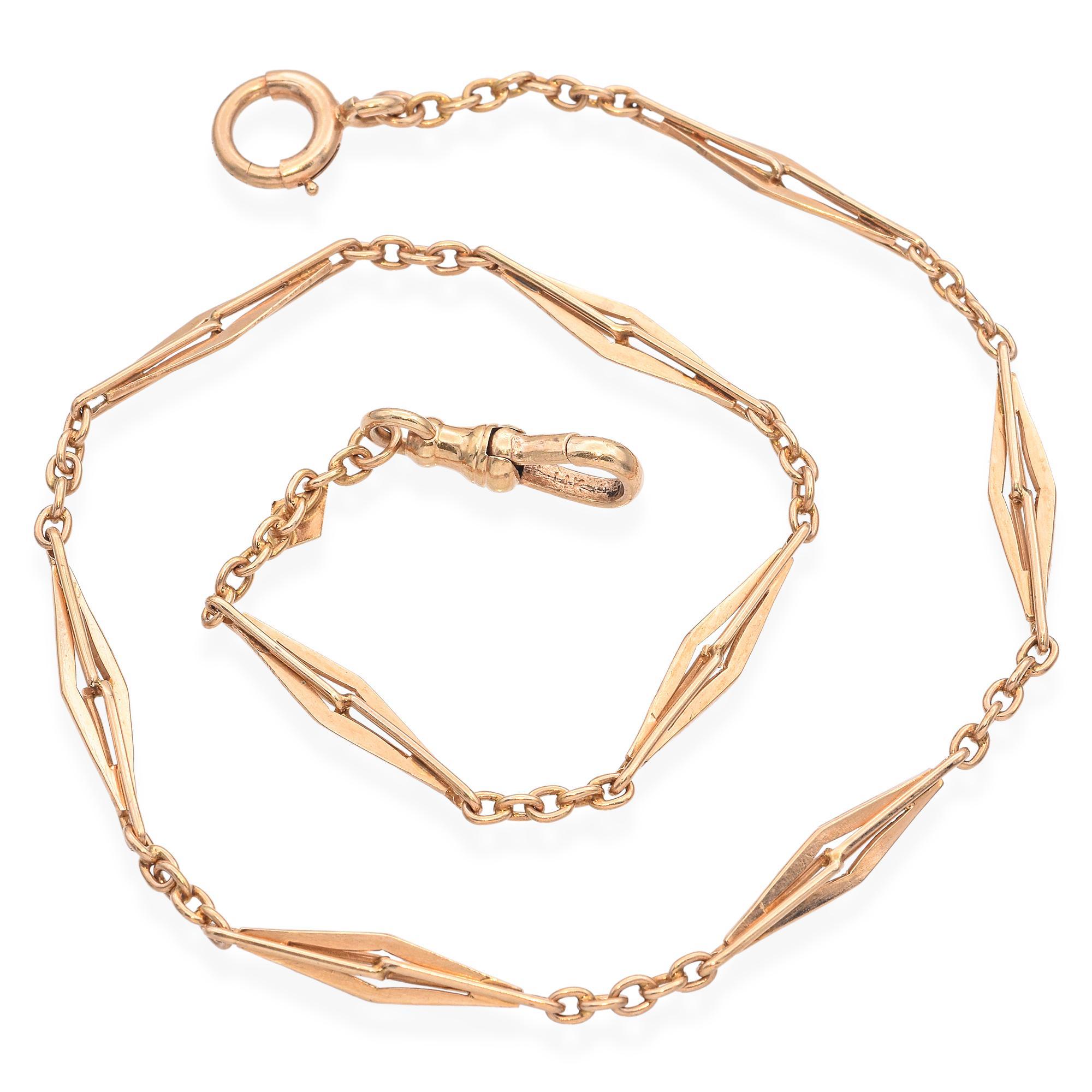 Diese Vintage-Halskette ist aus 14-karätigem Gelbgold gefertigt und besteht aus einer Reihe eleganter geometrischer Glieder, die entlang einer zarten Kette angeordnet sind. Das minimalistische Design verbindet klare Linien mit klassischer Eleganz