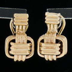 Orecchini Omega d'epoca in oro giallo 14k lucidati con scanalatura a incastro e intrecciati