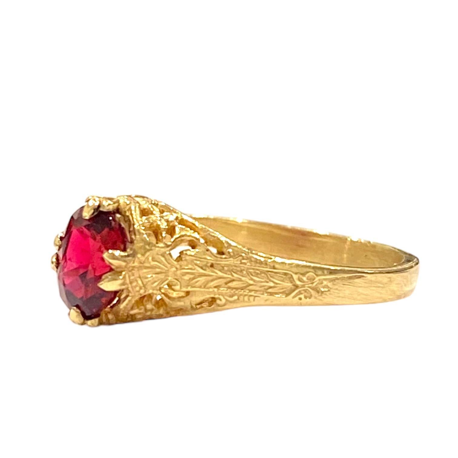 Crafted in 14K yellow gold, the ring features an open work floral design set with an oval cut natural red spinel.
Spinel: approx. 0.75ct.
Measurements:
Front: 7.5 mm H x 6 mm W x 6 mm D
Back: 2 mm
Weight: 2.7 grams
Size: 7 (sizable)
Marked: 14K and