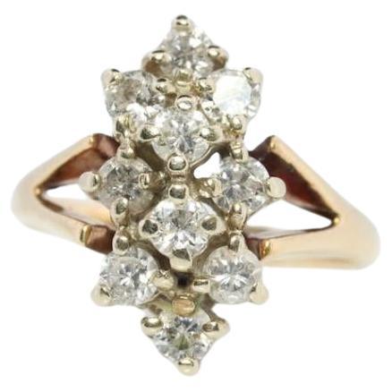 Anillo vintage de oro amarillo de 14k. Anillo en racimo de diamantes redondos. Diamante en cascada. 0.4