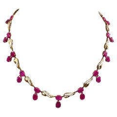 Halskette aus 14 Karat Gelbgold mit Rubin und Diamanten