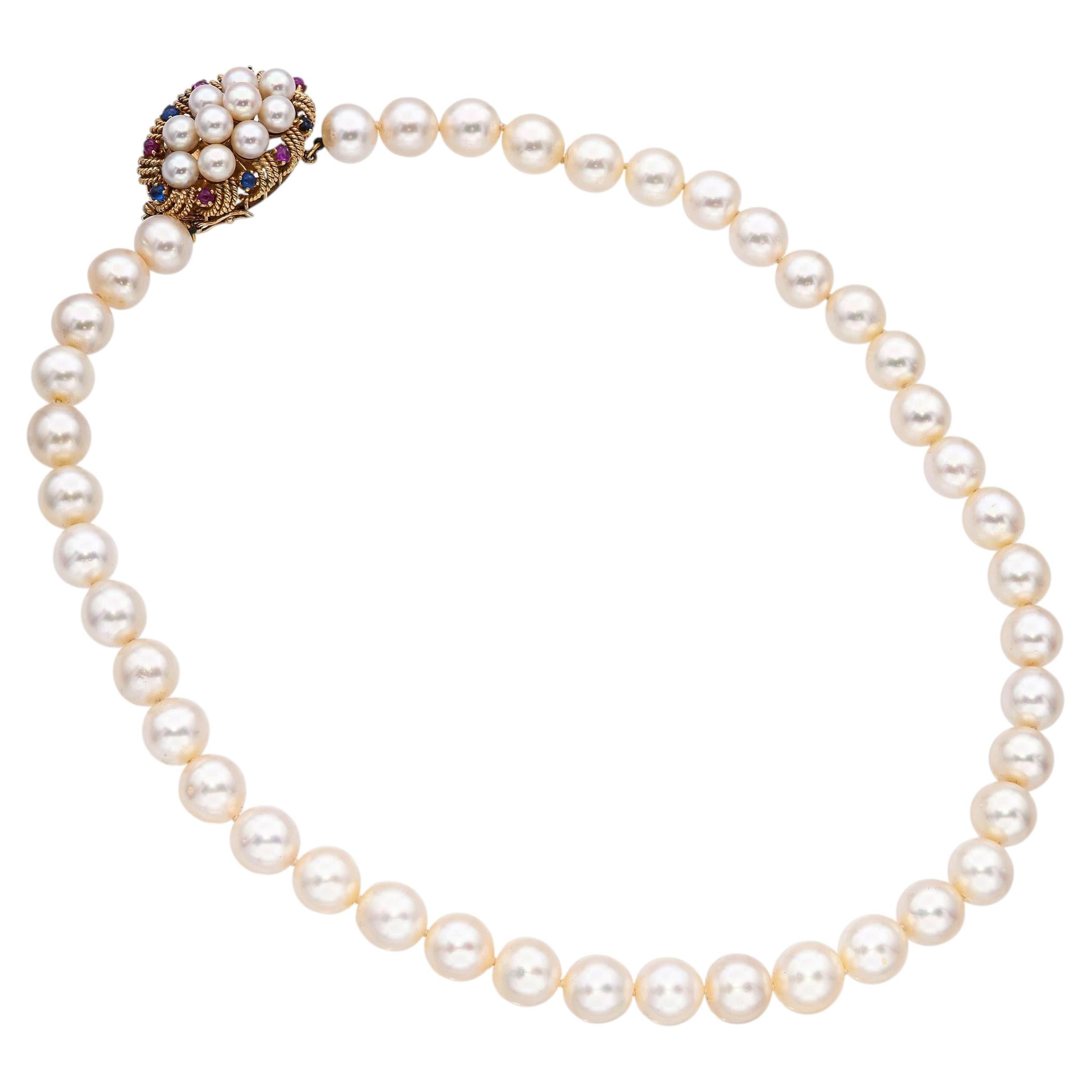 Collar vintage de oro amarillo de 14k con cabujón de rubí y zafiro y cierre de perlas