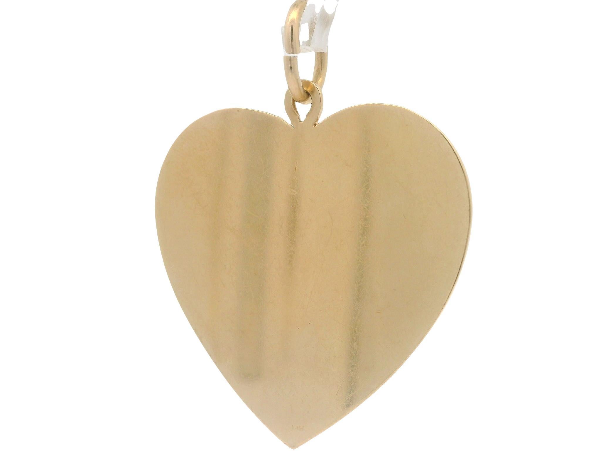Round Cut Vintage 14k Yellow Gold Ruby Cluster Fluted Grooved Large Heart Pendant Charm For Sale