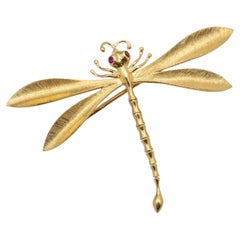 Broche libellule vintage en or jaune 14 carats avec yeux de rubis