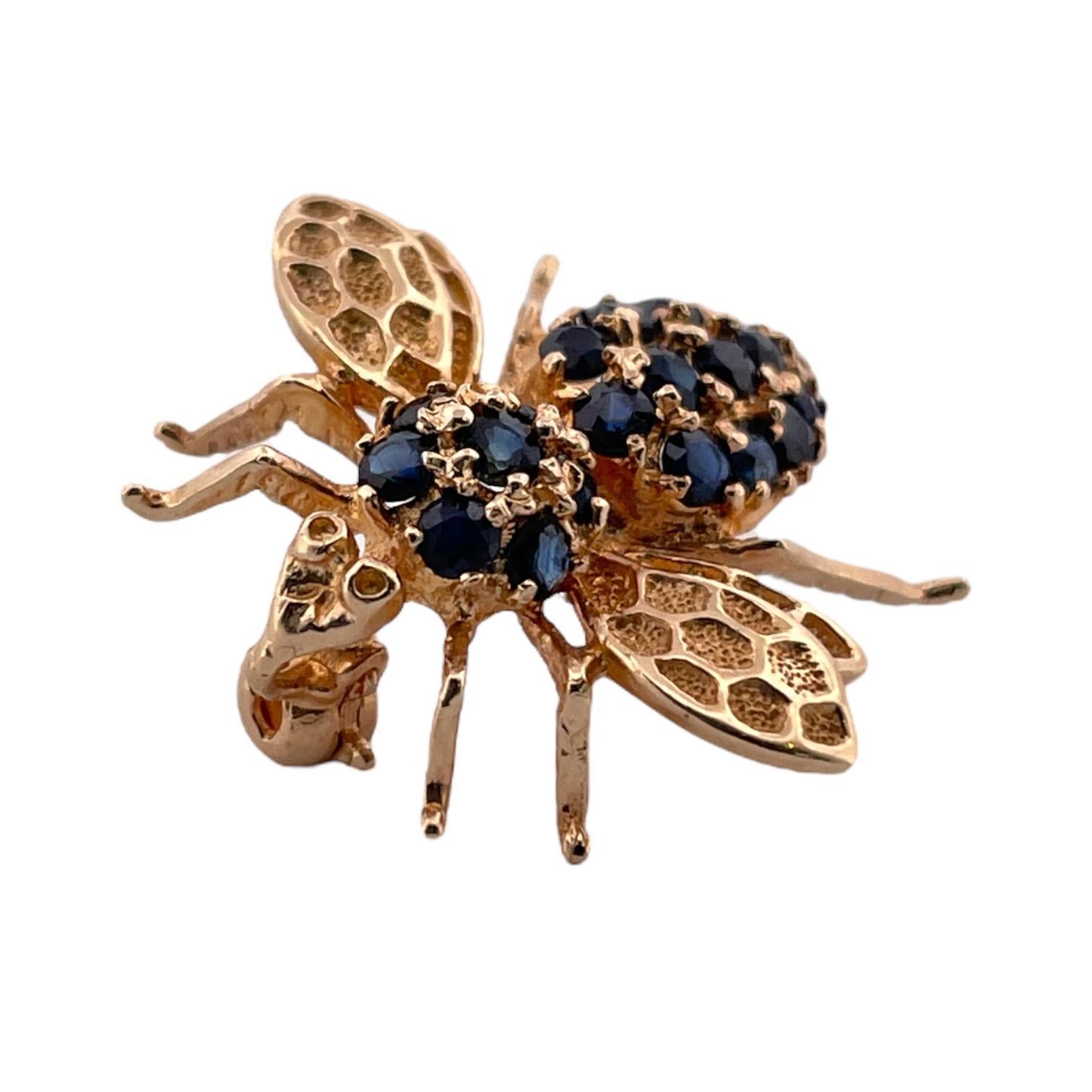 Experience the charm of yesteryear with this vintage bee brooch, crafted in 14K yellow gold and adorned with sapphires totaling 1.00 Total carat weight. Weighing 2.76 grams, it's a whimsical yet elegant nod to nature's artistry, perfect for any
