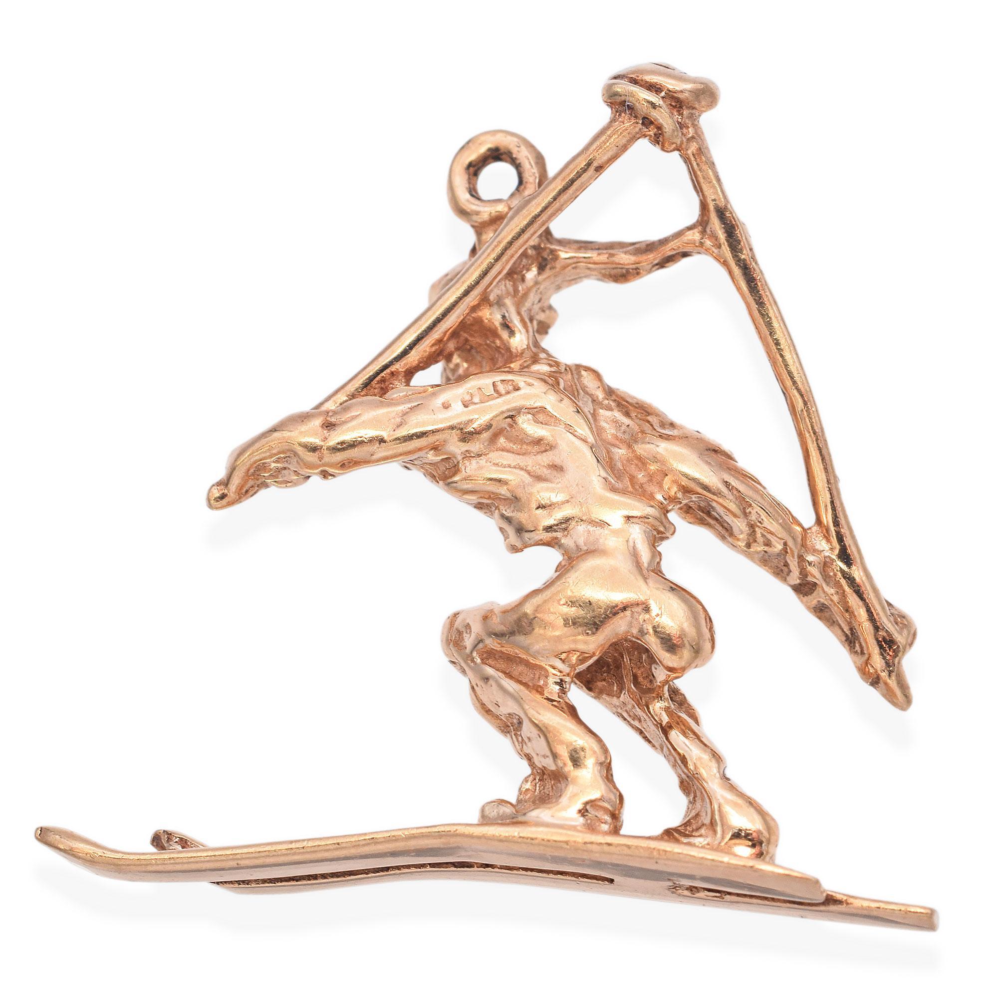 A dynamic Skiing Figure charm, crafted in lustrous gold, capturing the essence of a skier in motion. The intricate detailing highlights the skier's posture and equipment, creating a sense of movement and adventure.

Weight: 5 grams