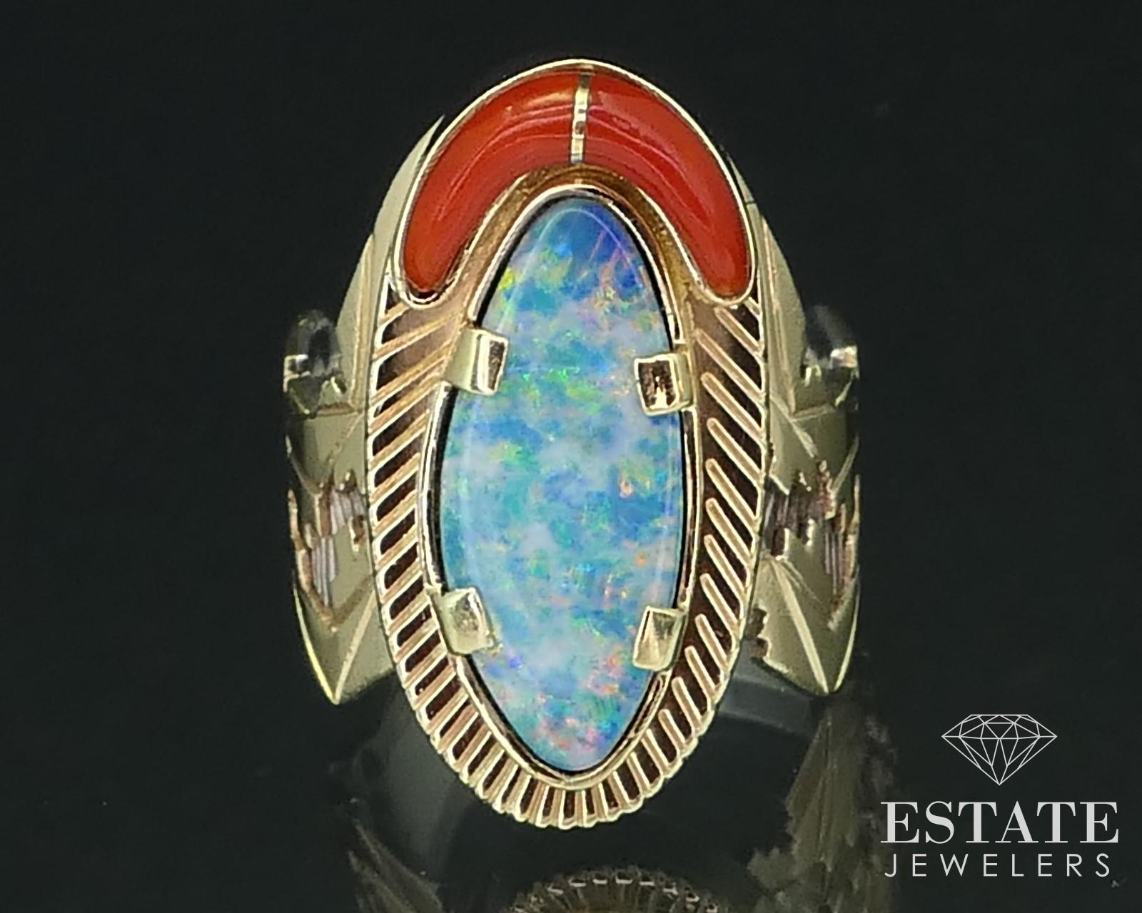 Gorgeous heavy 14k yellow gold and sterling Native American ring set with a vivid 19mm by 8mm Australian opal and red coral. Heavy 14k gold head and detailed band. Stamped LY 14k 925 SIZE-7