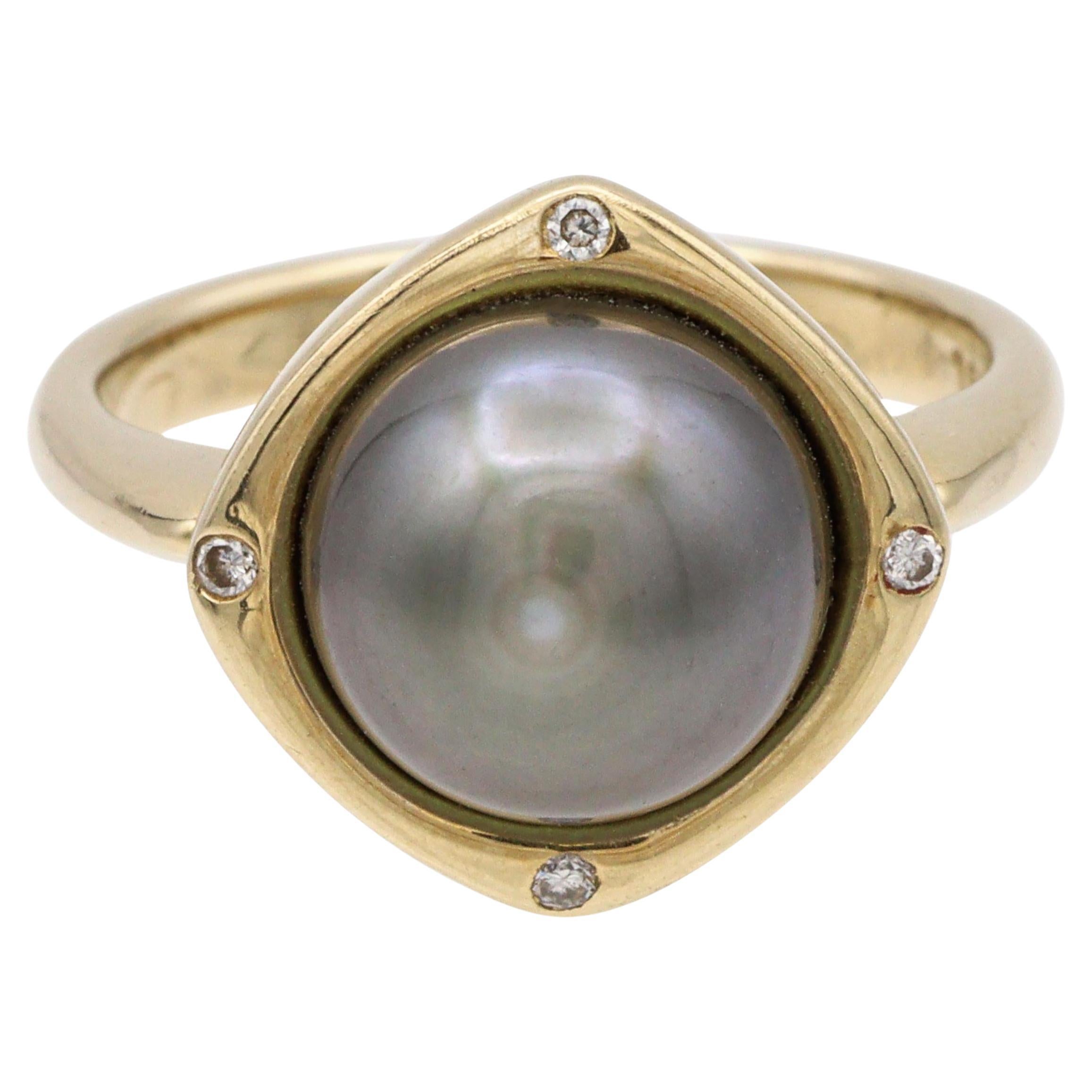 Anillo vintage de oro amarillo de 14k con perla de Tahití y diamantes en venta