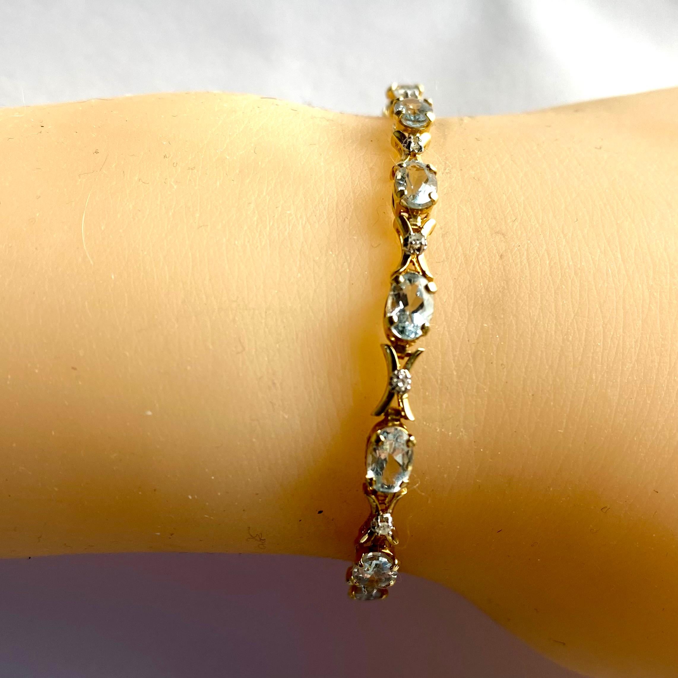 Oval Cut Vintage 14K Yellow Gold Tennis Bracelet with Aquamarines and Diamonds