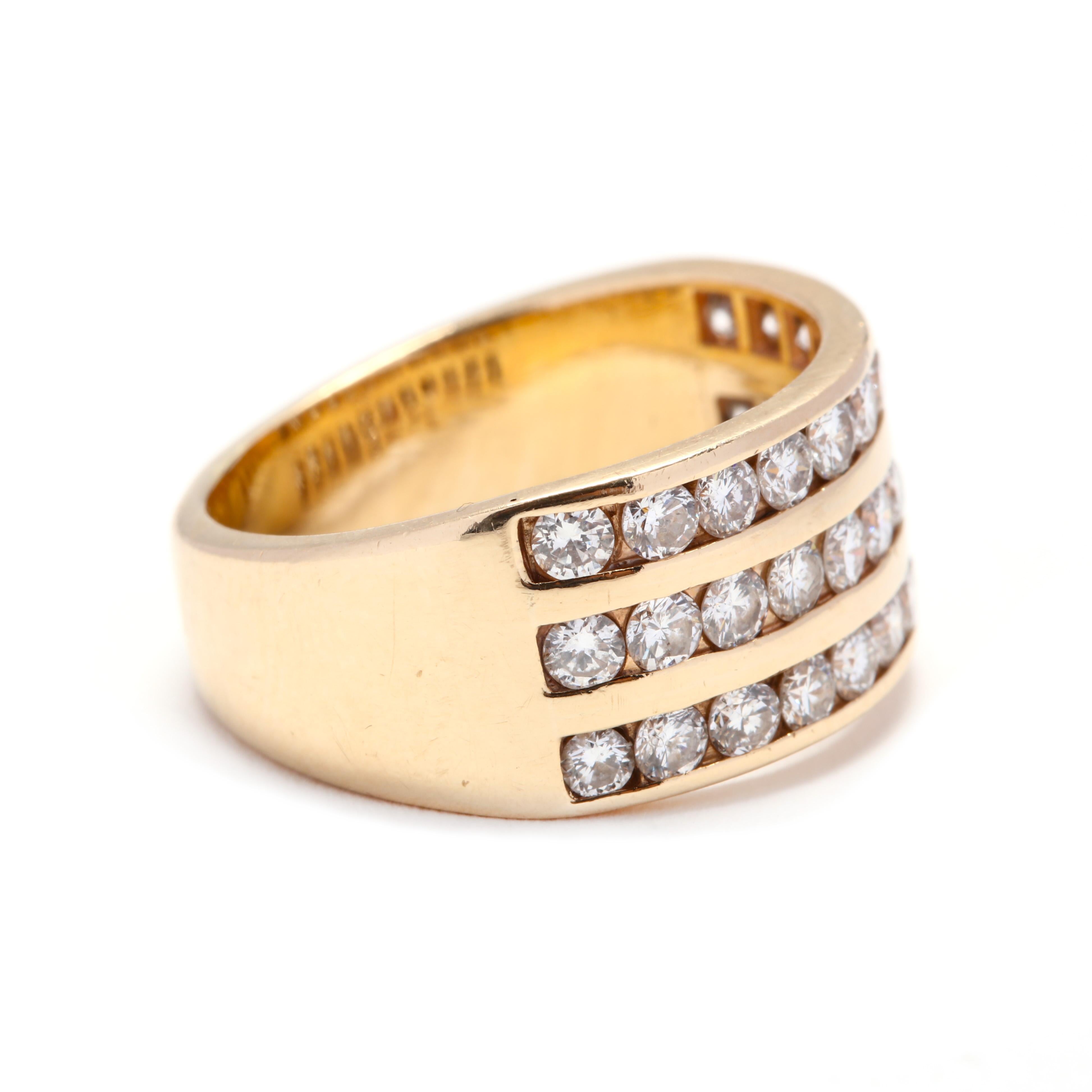 A vintage 14 karat yellow gold diamond ring. This ring features a three row design with channel set round brilliant cut diamonds weighing approximately 1.55 total carats

Stones:
- diamonds, 33 stones
- round brilliant cut
- 2.3 - 2.4 mm
-