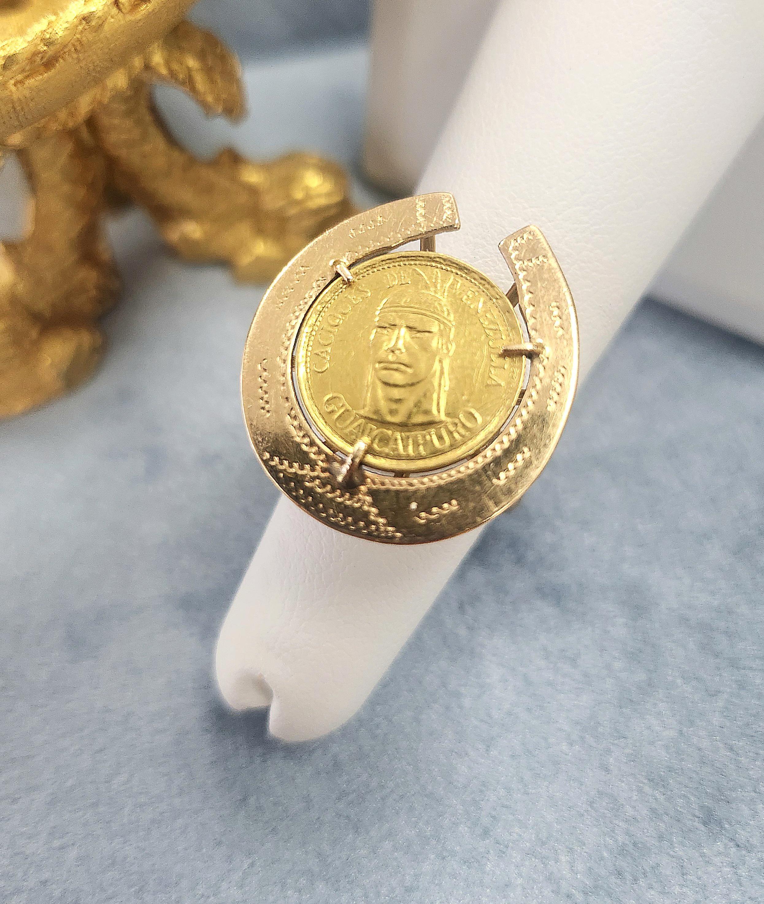 Striking & Unique 14K Gold Venezuelan Coin Horseshoe Ring – Handmade Statement Piece
This one-of-a-kind ring is a conversation starter! Featuring an authentic Caciques de Venezuela Guaicaipuro coin, beautifully set in a handcrafted horseshoe design,
