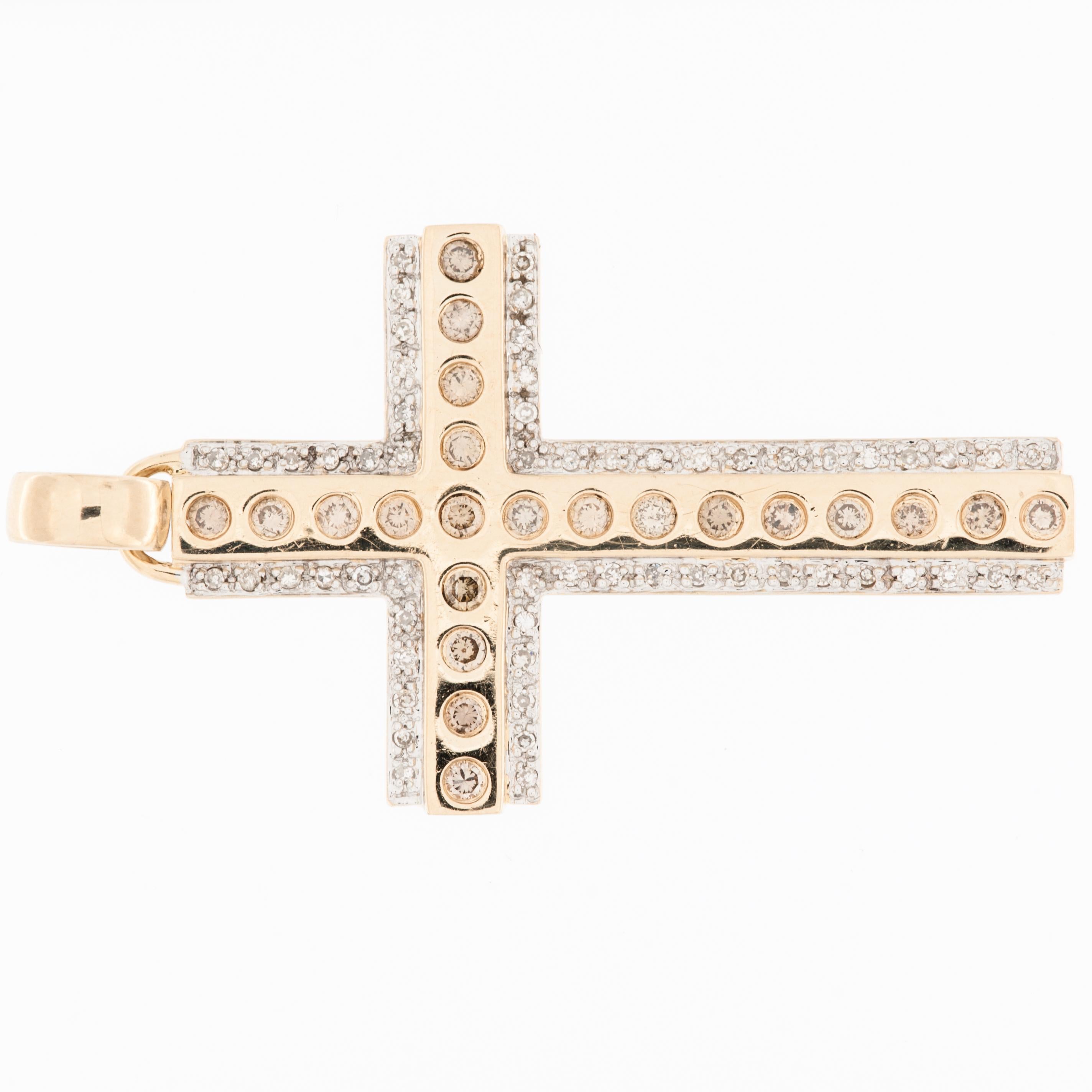 The Vintage 14kt Gold German Cross with Diamonds is a unique and intricate piece of jewelry that combines traditional craftsmanship with luxurious materials. 

The cross is made of 14-karat gold, which is known for its rich, warm color and