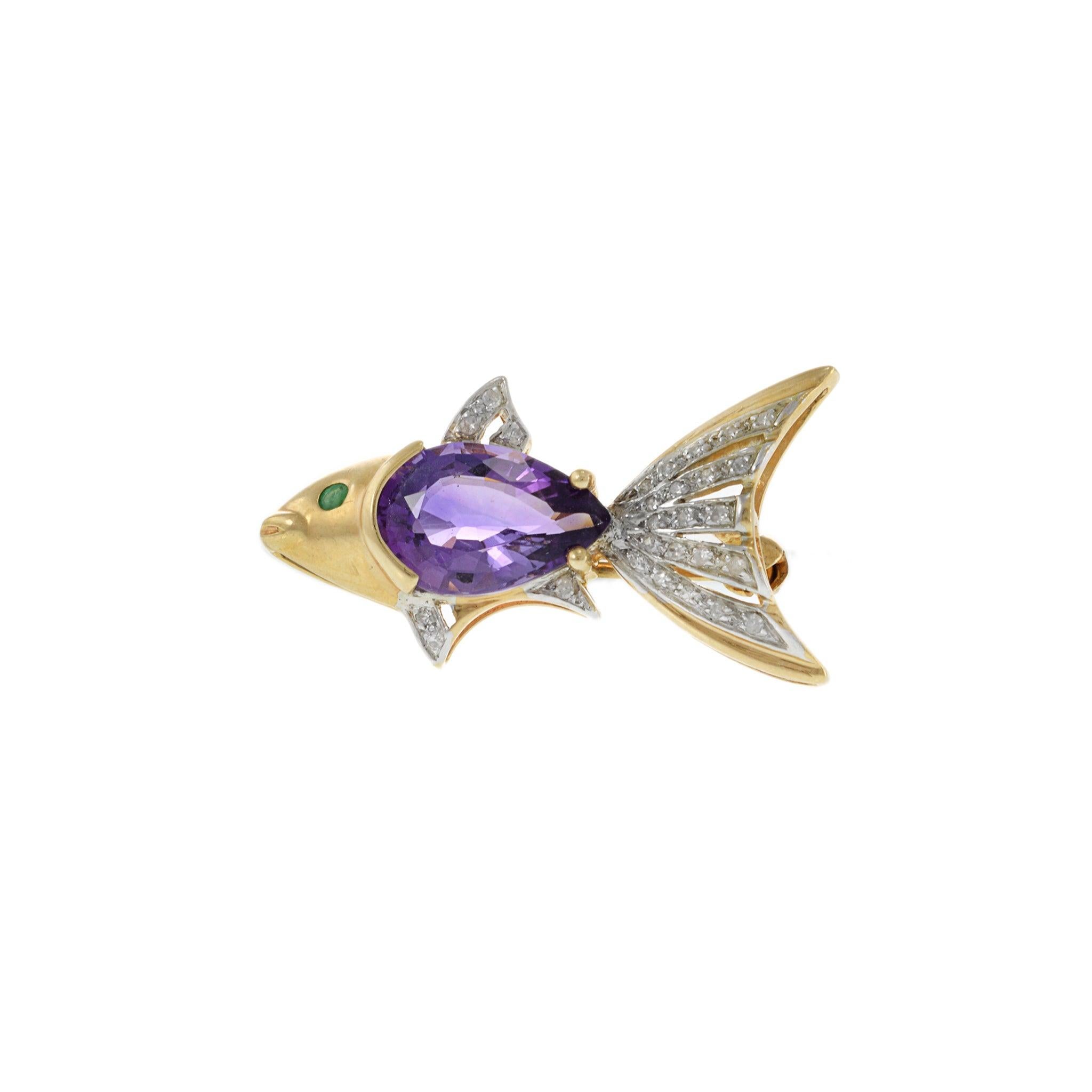 This intricate 14kt yellow gold fish pin is adorned with a vibrant amethyst center stone and sparkling diamond accents, making it a luxurious addition to any jewelry collection. Crafted with quality materials and attention to detail, it's a timeless