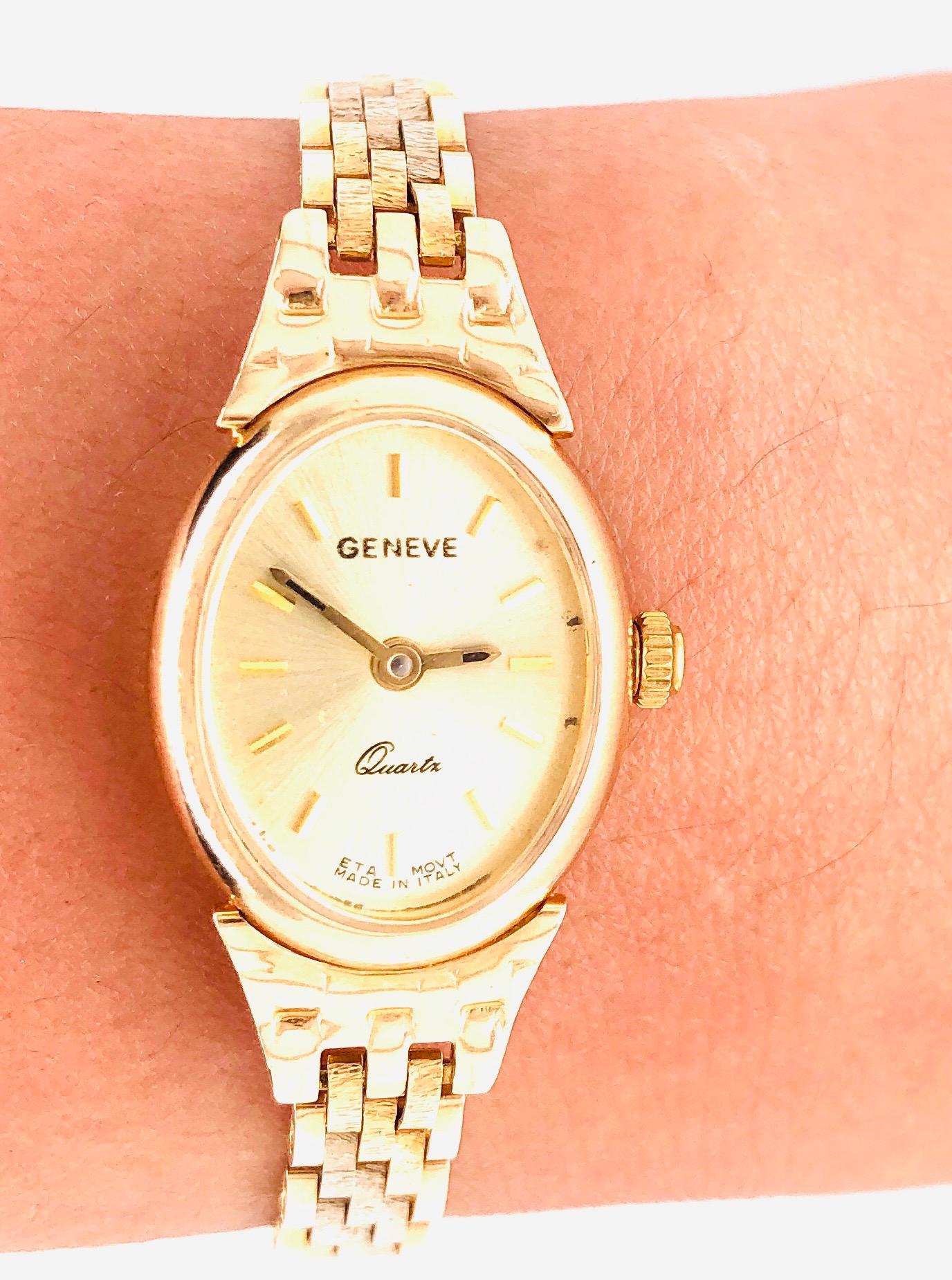 14Kt Yellow Gold Band and Watch by Geneve Quartz having a link gold band weighing an astounding 21 grams of 14Kt gold. Weight is without works.  Swiss Parts Made in Italy
Universal Geneve is sometimes confused with the Geneva Watch Group, but these