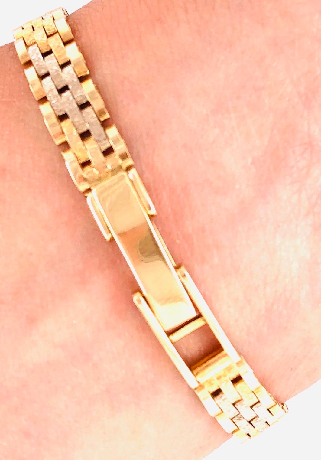 Bracelet et montre vintage en or jaune 14 carats par Geneve Quartz Unisexe en vente