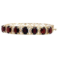 Vintage 14KT Yellow Gold Garnet Bangle Bracelet