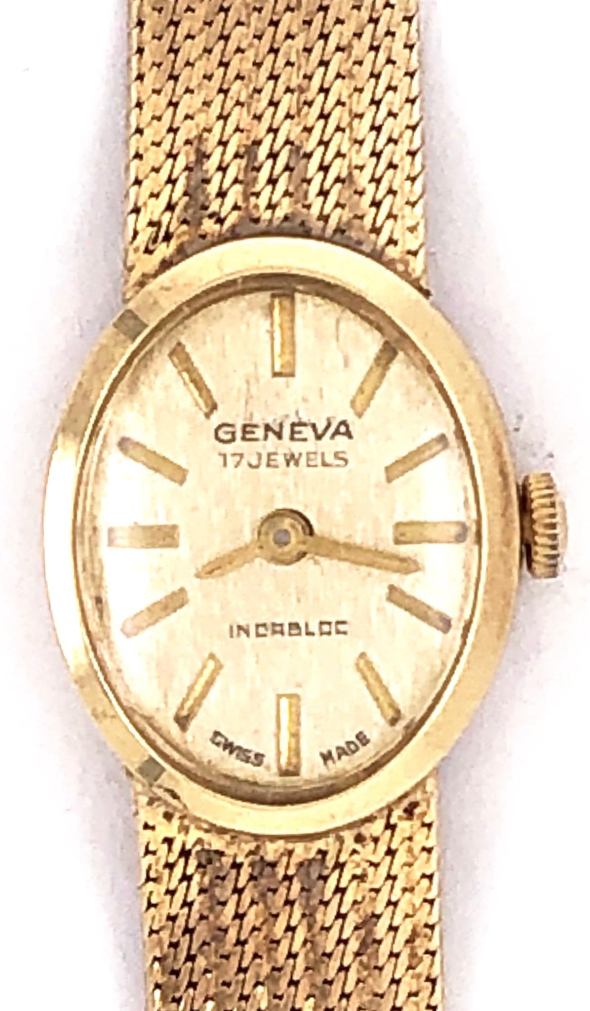 7inch Vintage 14Kt Yellow Gold Geneva Swiss Made Watch weighting an astounding 18.1 grams having a lovely mesh band all gold. Weight is without the works. 
17 Jewels-front 6 Jewels-back Marked 585 Italy
Universal Geneve is a Swiss company that has