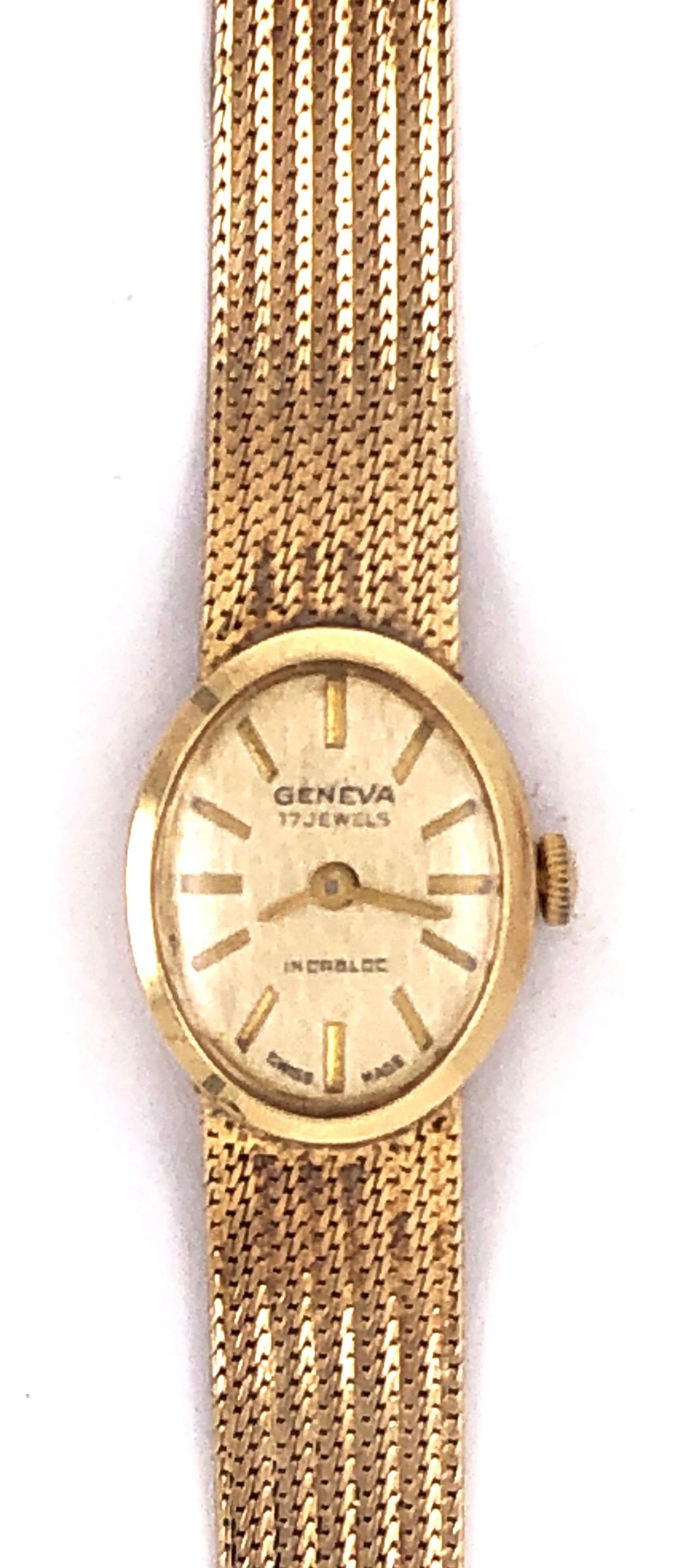 Vintage 14 Karat Yellow Gold Geneva Swiss Made Watch In Good Condition For Sale In Stamford, CT