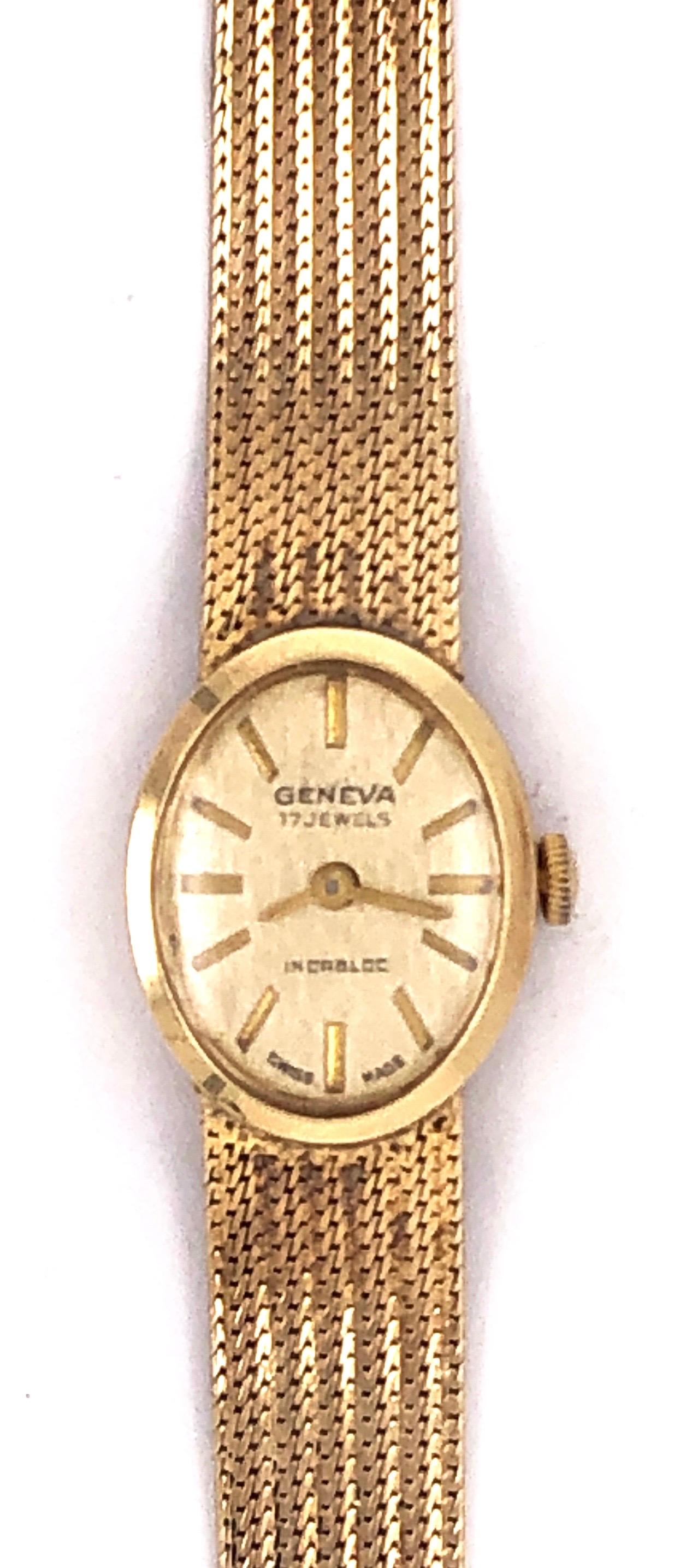 Vintage 14 Karat Yellow Gold Geneva Swiss Made Watch In Good Condition For Sale In Manhasset, NY