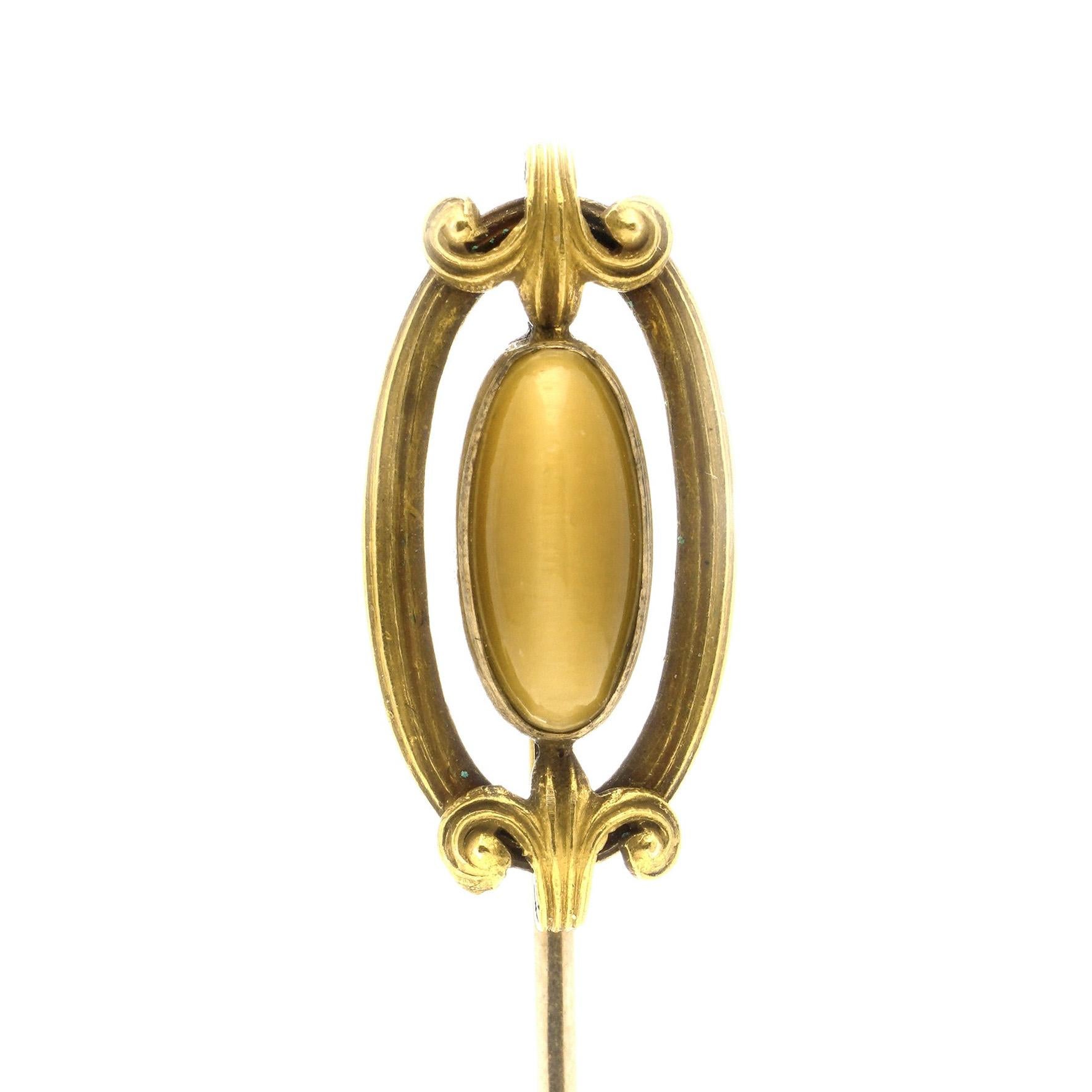 Vintage 14kt. yellow gold hat pin brooch with tiger's eye. 
Hallmarked with 14kt. gold. 

Dimensions - 
Length x width: 6.5 x 1.1 cm 
Weight: 2.00 grams

Condition: Pre-owned, has some minor age wear, no damage, great overall condition.