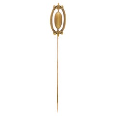 Retro 14kt. yellow gold hat pin brooch with tiger's eye. 
