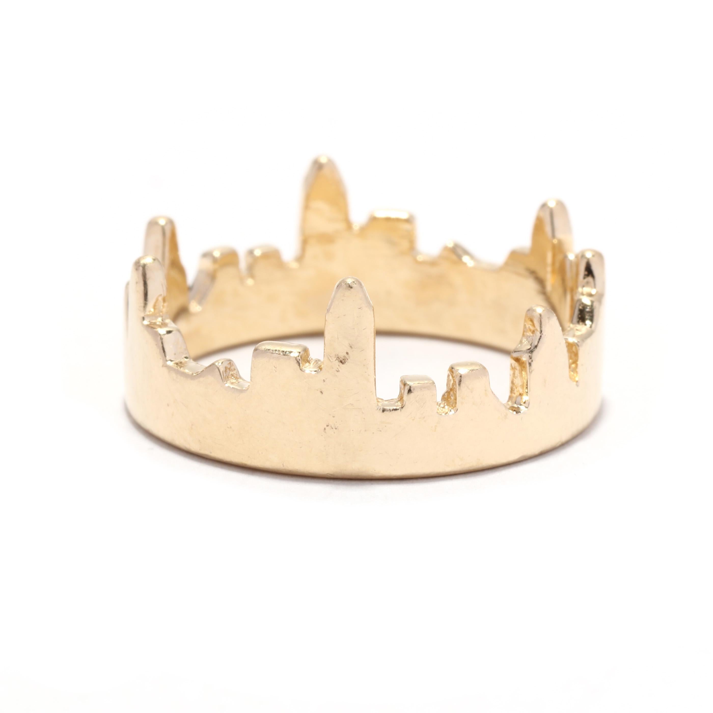 A vintage 14 karat yellow gold skyline ring. This wide band features a flat band with a carved skyline motif in an eternity design.

Ring Size 8.5

Width: 8.60 mm

Weight: 3.5 dwts. / 5.44 grams

Stamps: 14K


Ring Sizings & Modifications:
* We are